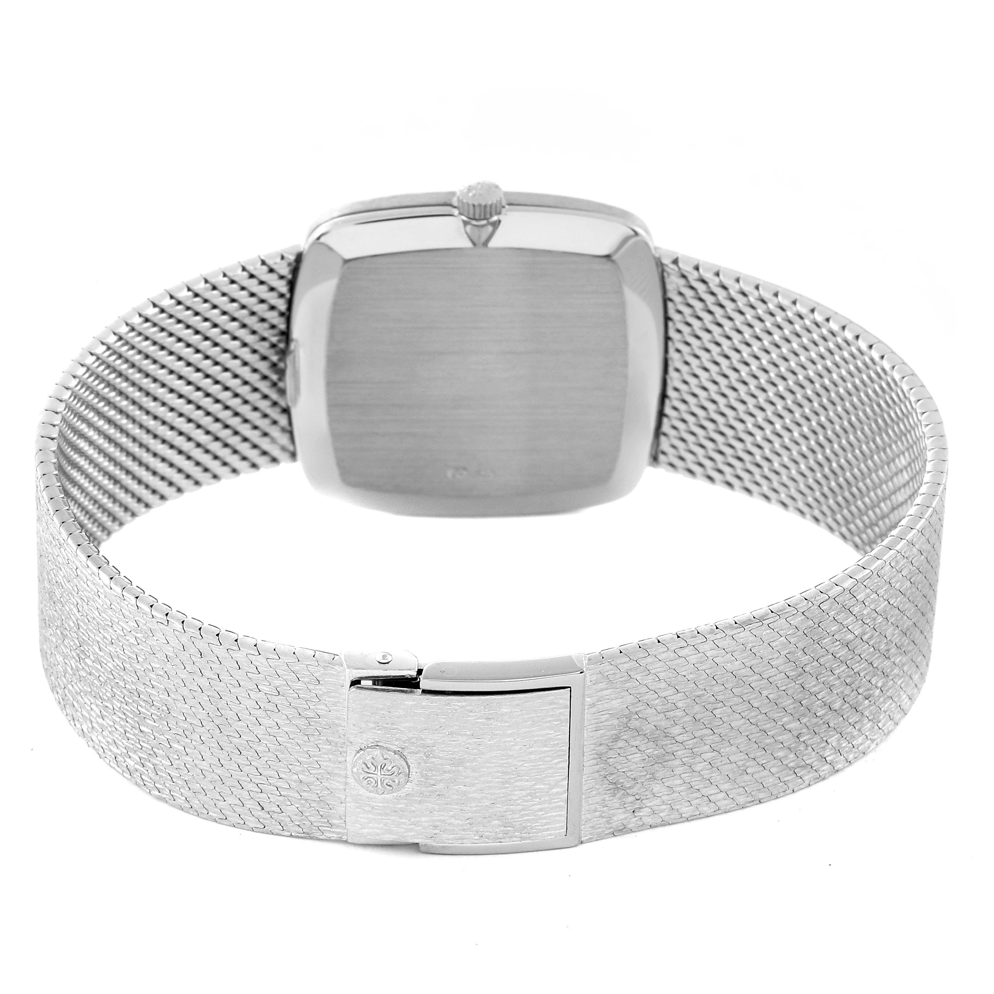 This image shows the back view of a Vintage Patek Philippe watch, highlighting its mesh bracelet and clasp.