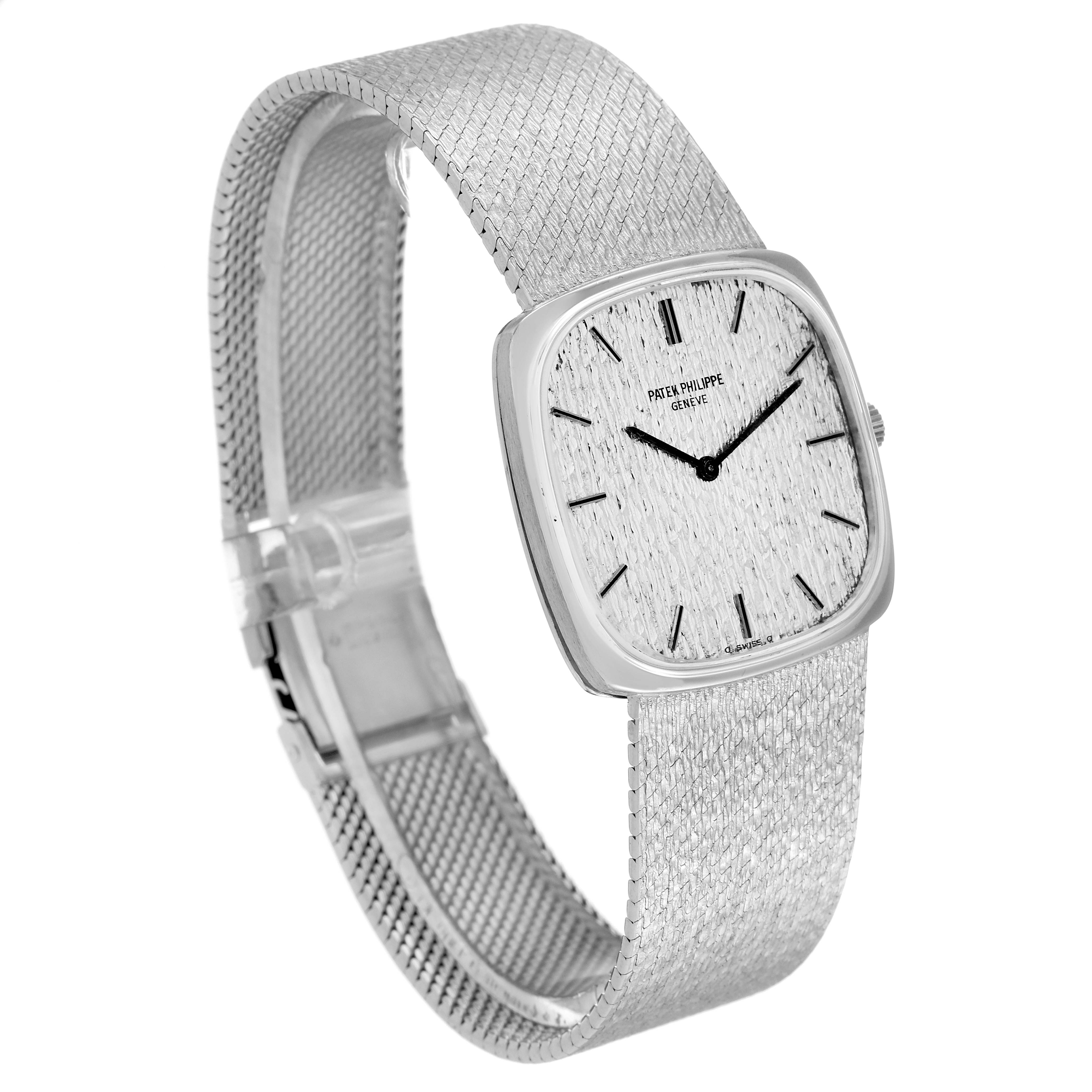 The image shows a side angle view of the Patek Philippe Vintage 3666 Men's White Gold Silver Dial 3666 Men's White Gold Silver Dial watch, highlighting its dial and textured metal band.