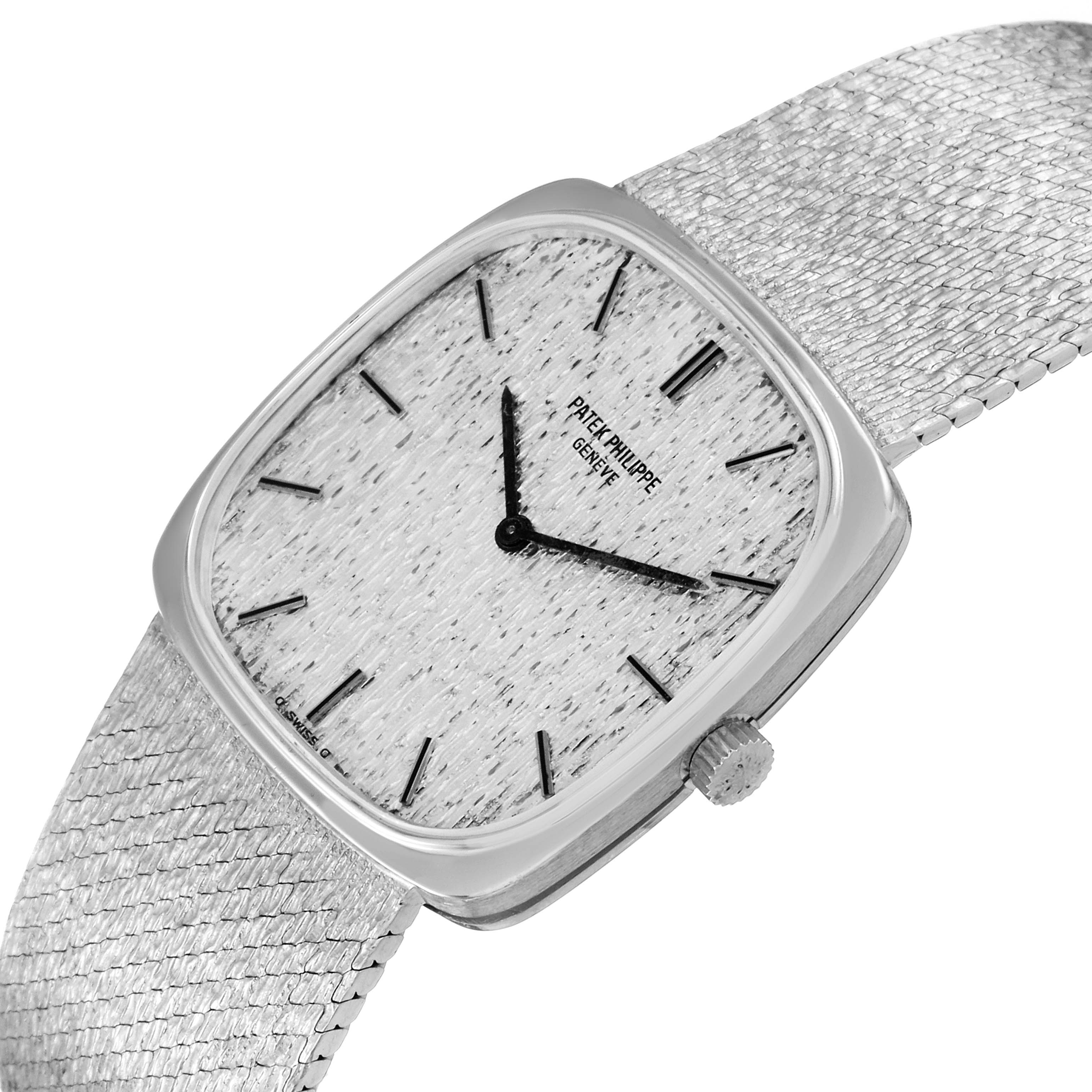 The image shows a close-up angle of the dial, case, and part of the bracelet of a Vintage Patek Philippe watch.