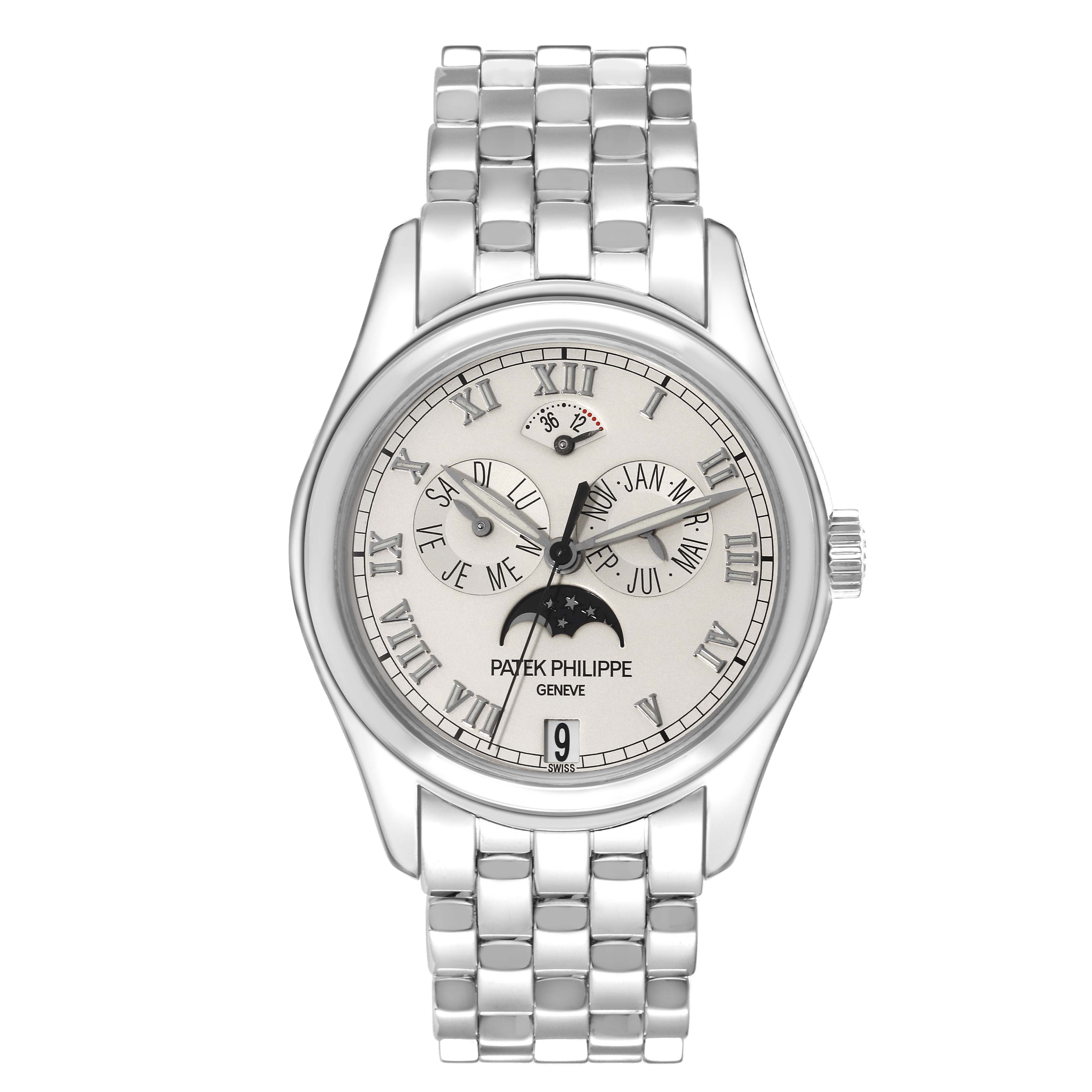 The image shows a front view of a Patek Philippe Complications 5036/1 Men
s White Gold Silver Dial 5036/1 Men
s White Gold Silver Dial model watch with a metal band and various date and time subdials.