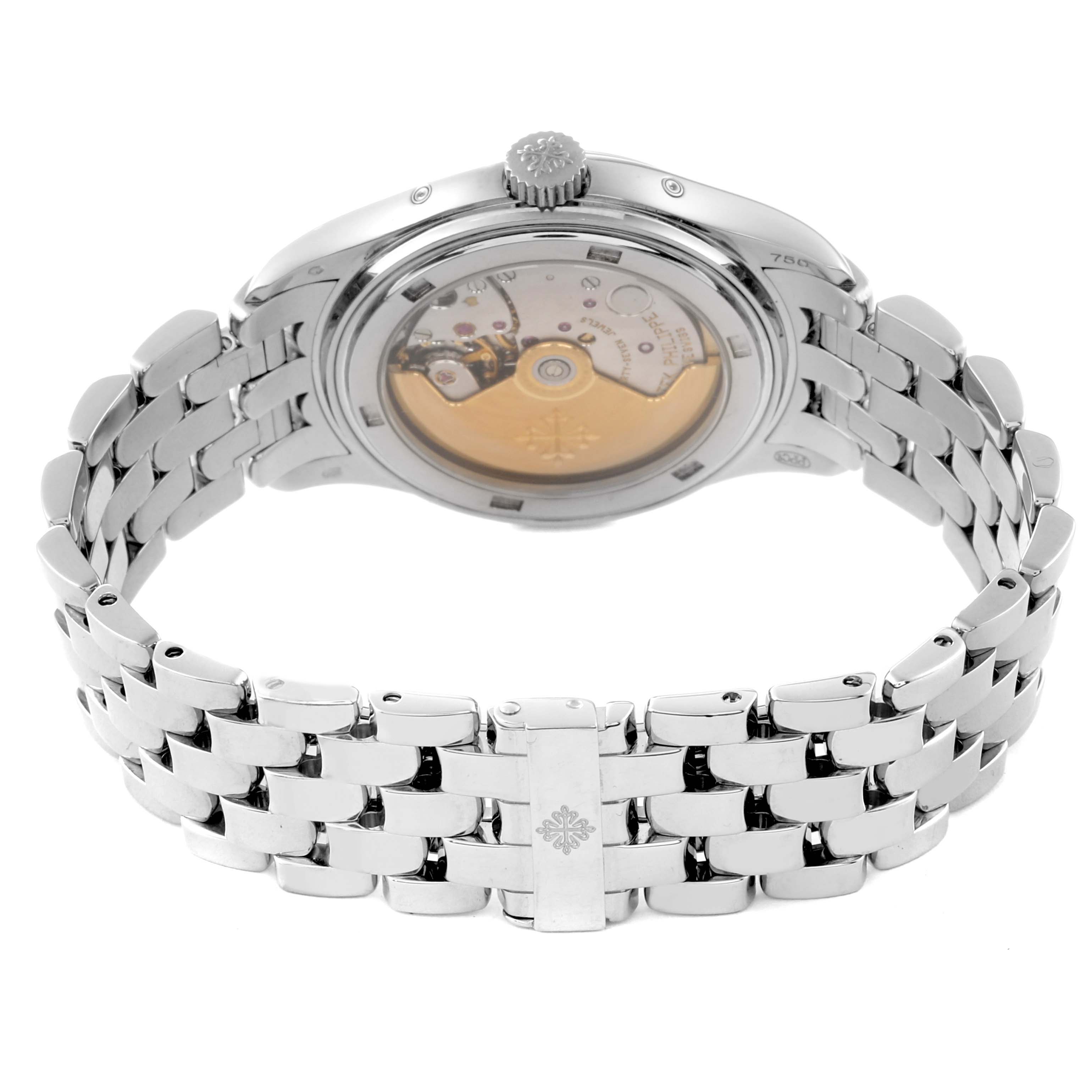 The image shows the back view of the Patek Philippe Complications 5036/1 Men
s White Gold Silver Dial 5036/1 Men
s White Gold Silver Dial model, highlighting its automatic movement and metal bracelet.
