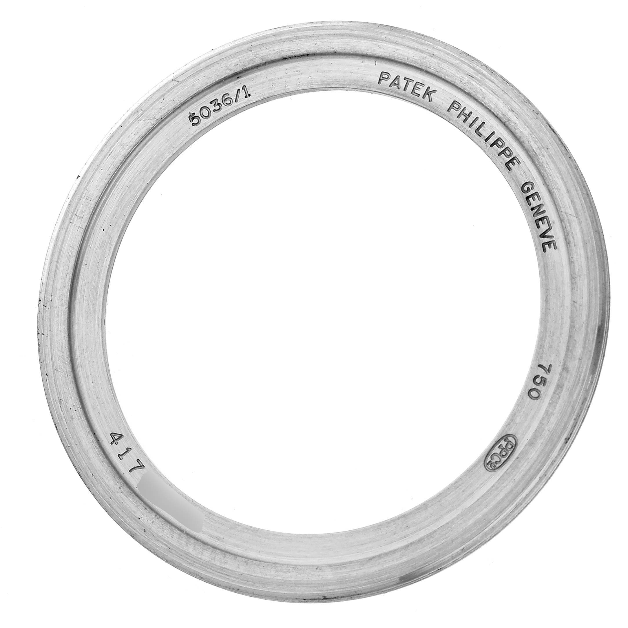 This image shows the inner bezel ring of the Patek Philippe Complications 5036/1 Men
s White Gold Silver Dial 5036/1 Men
s White Gold Silver Dial model, viewed from above.