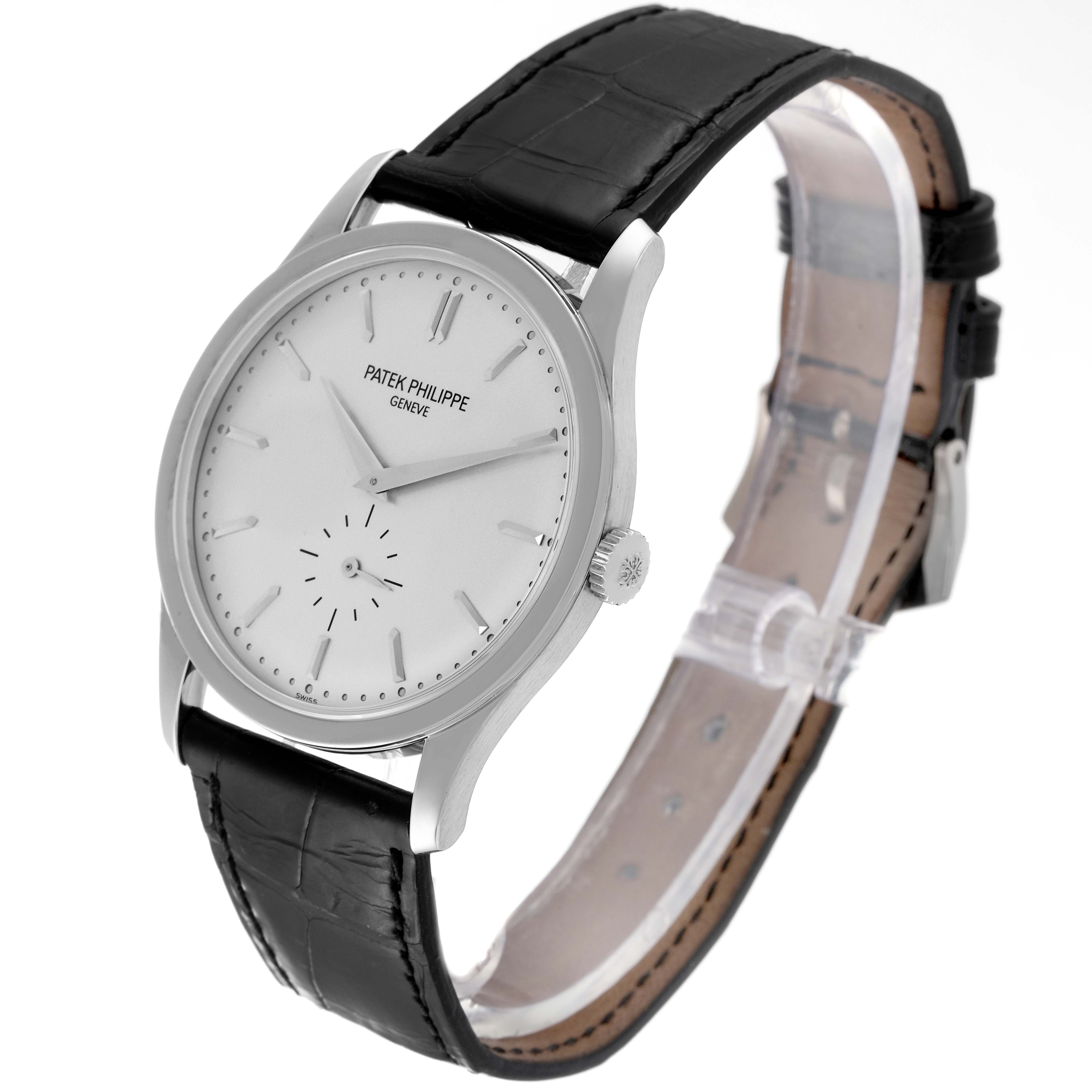 The image shows a Patek Philippe Calatrava 5196G Men
s White Gold Silver Dial 5196G Men
s White Gold Silver Dial watch at a three-quarter angle, displaying the dial, case, crown, and leather strap.