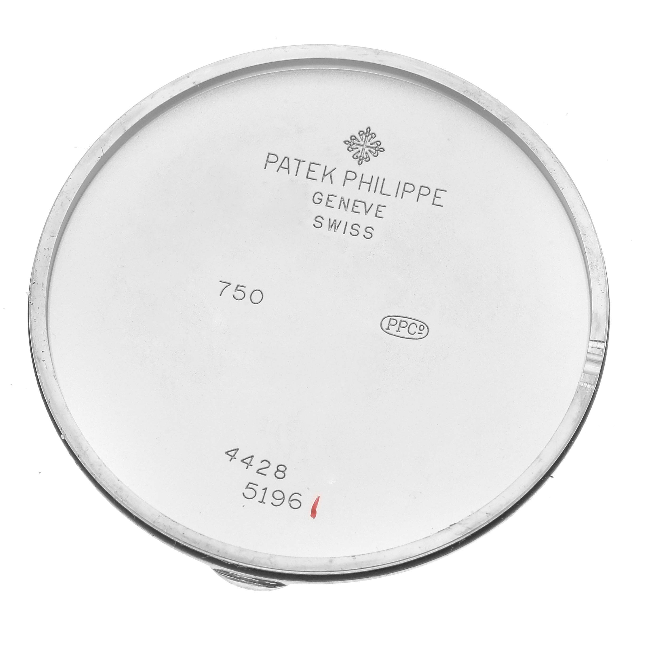 This image shows the inside case back of a Patek Philippe Calatrava 5196G Men
s White Gold Silver Dial 5196G Men
s White Gold Silver Dial watch, revealing model and manufacturer markings.