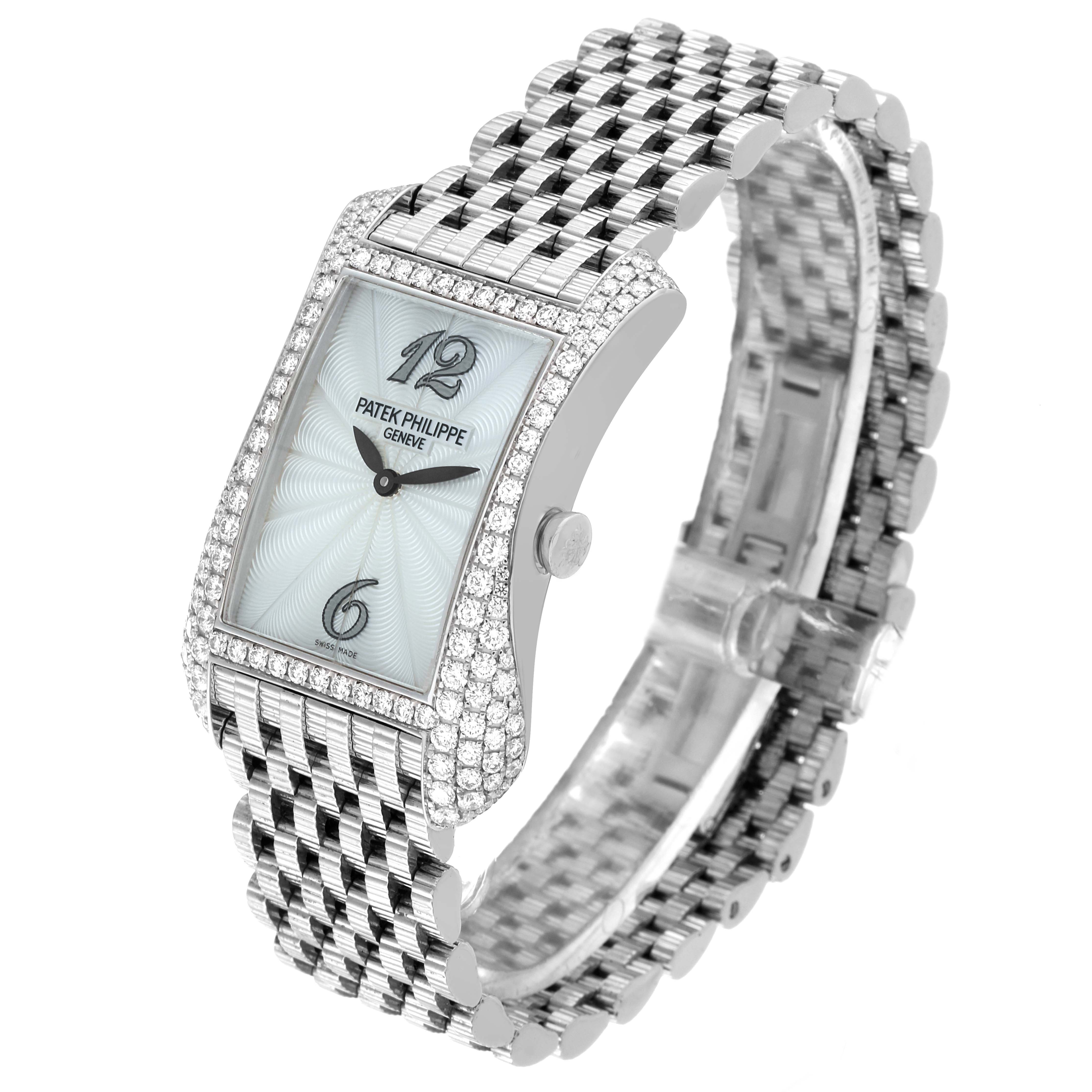 The image shows a Patek Philippe Gondolo 4972/1G-001 Women's White Gold Mother of Pearl Dial 4972/1G-001 Women's White Gold Mother of Pearl Dial watch at an angle highlighting the face, bezel, crown, and bracelet.