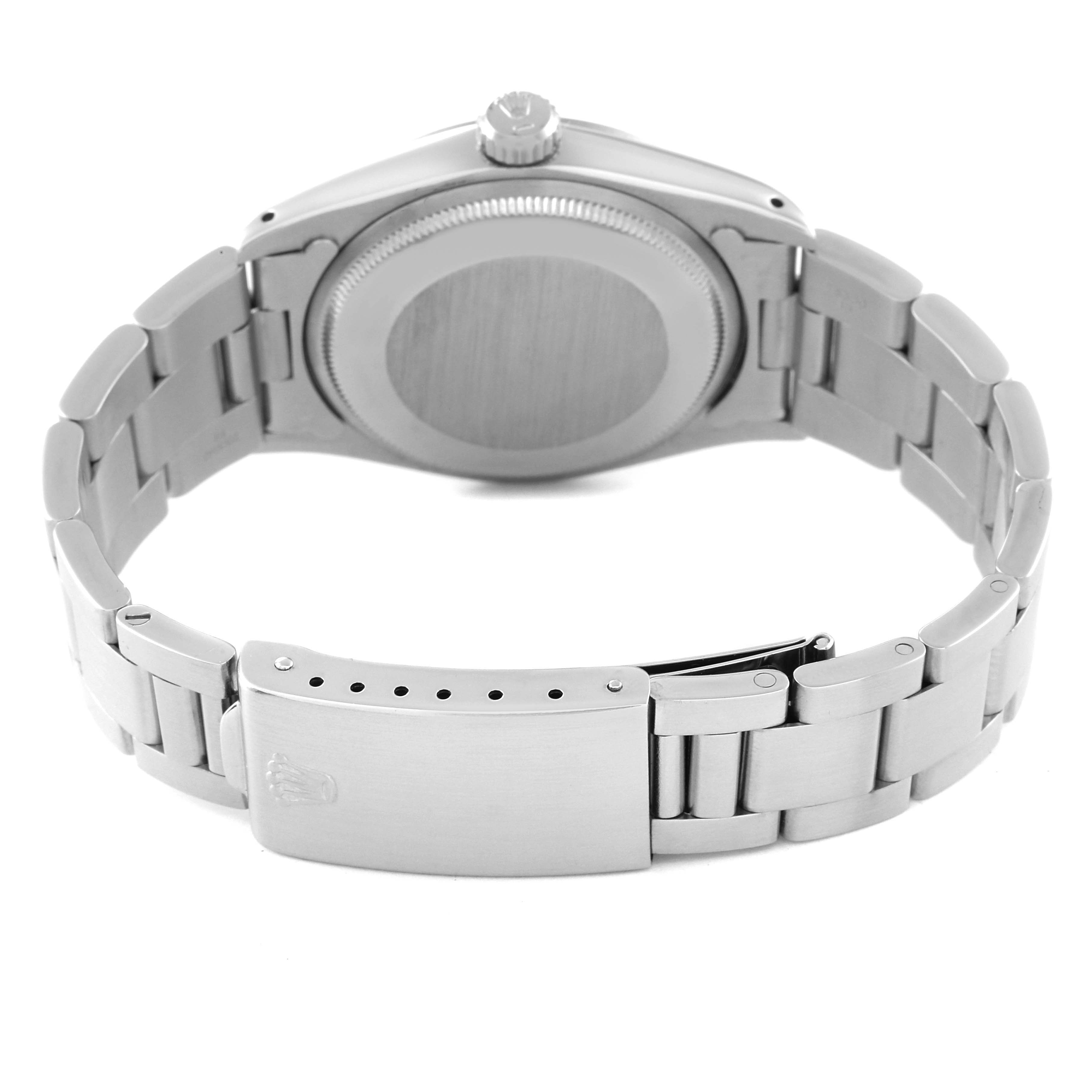 The image shows the back view of the Rolex Vintage Collection 1500 Men's Stainless Steel Silver Dial 1500 Men's Stainless Steel Silver Dial model, highlighting the case back, crown, and metal bracelet, including the clasp.