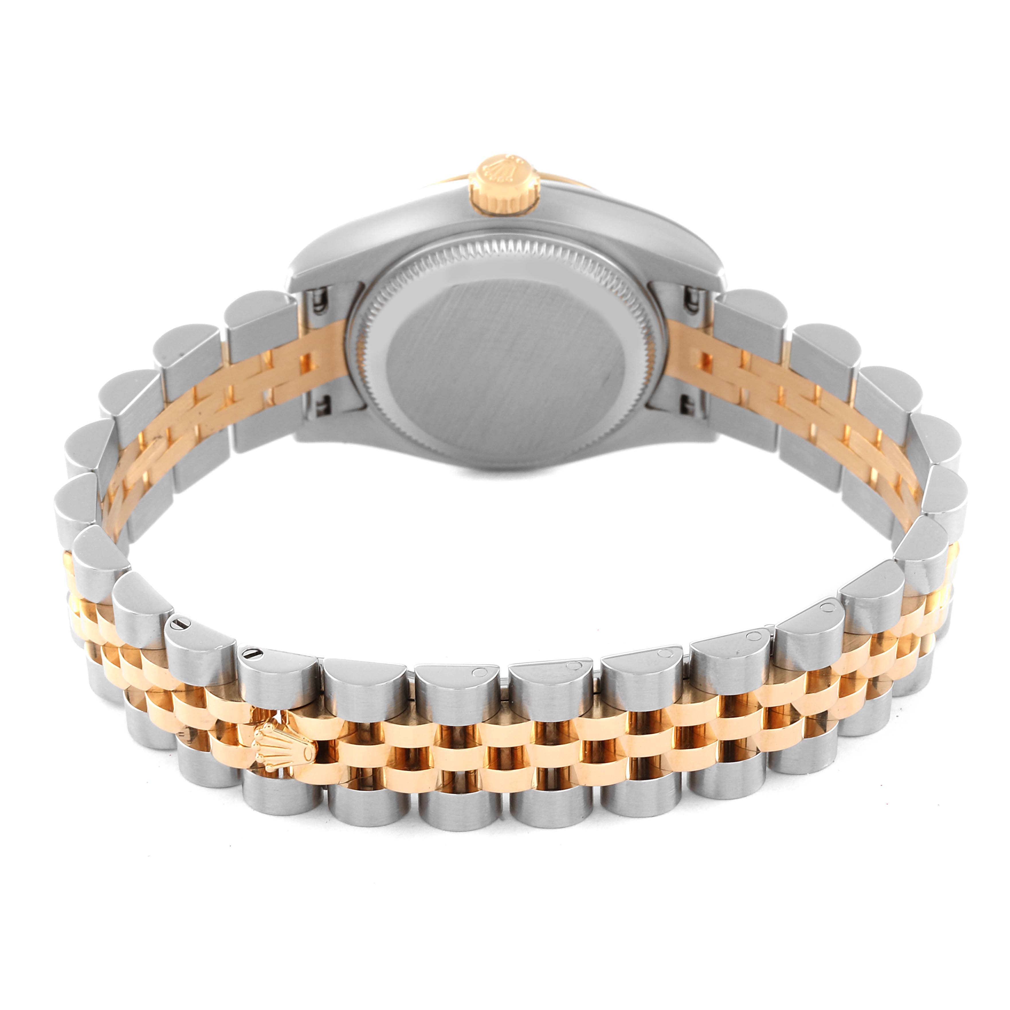 The image shows the back view of a Rolex Datejust 179173 Women's Steel and Gold (two tone) Champagne Dial 179173 Women's Steel and Gold (two tone) Champagne Dial watch, highlighting its two-tone bracelet and clasp.