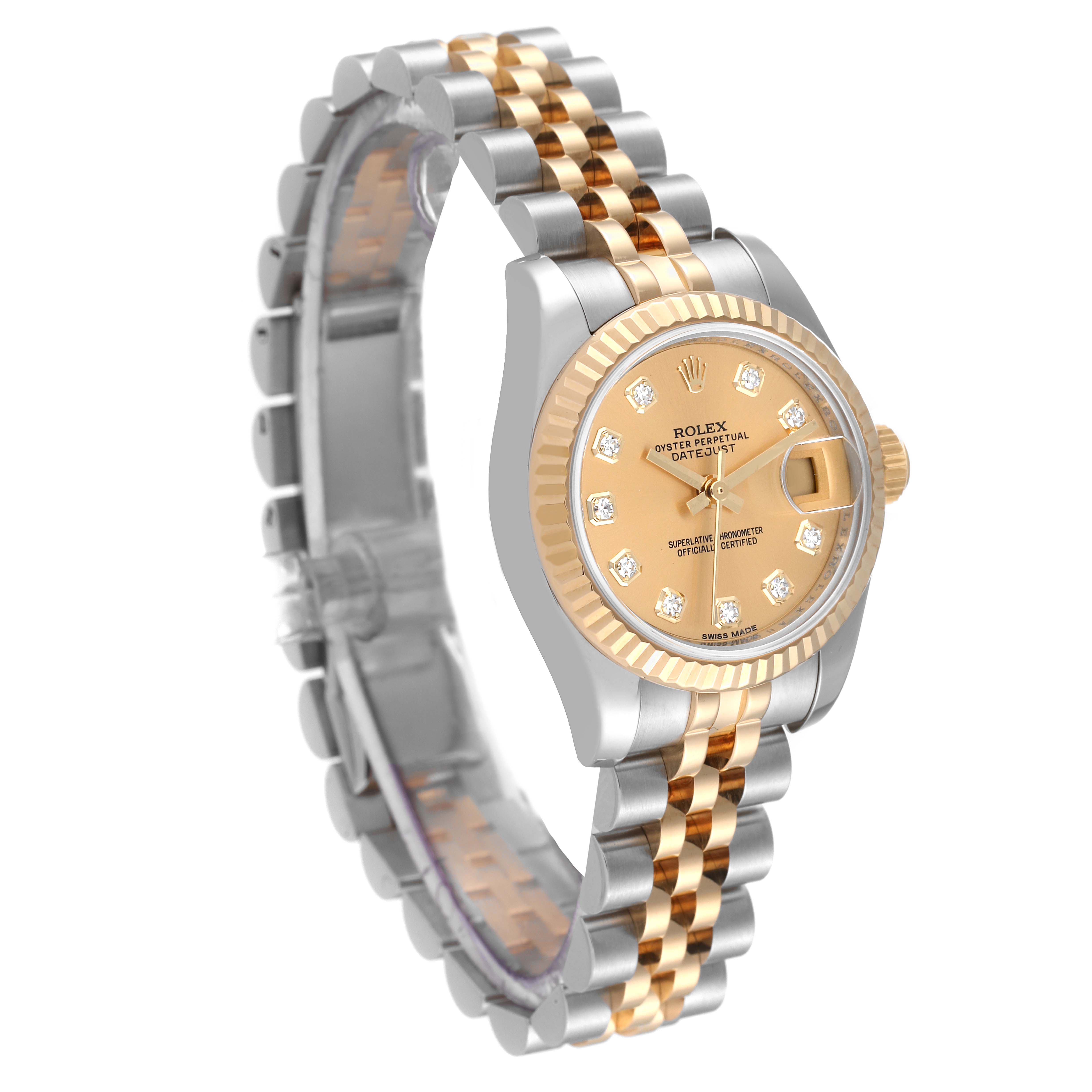 This image shows the front and left side of a Rolex Datejust 179173 Women's Steel and Gold (two tone) Champagne Dial 179173 Women's Steel and Gold (two tone) Champagne Dial watch, highlighting its two-tone bracelet and dial.