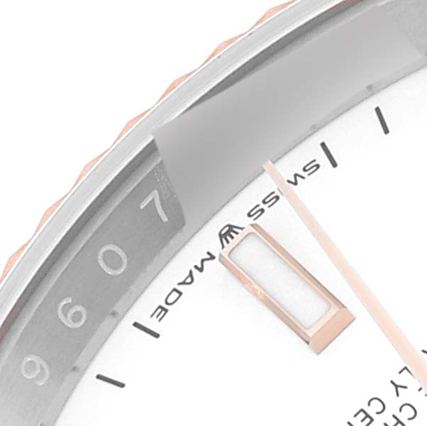 The image shows a close-up of the dial and bezel of a Rolex Datejust 126231 Men's Steel and Gold (two tone) White Dial 126231 Men's Steel and Gold (two tone) White Dial watch, highlighting the date indicator and "Swiss Made" text.