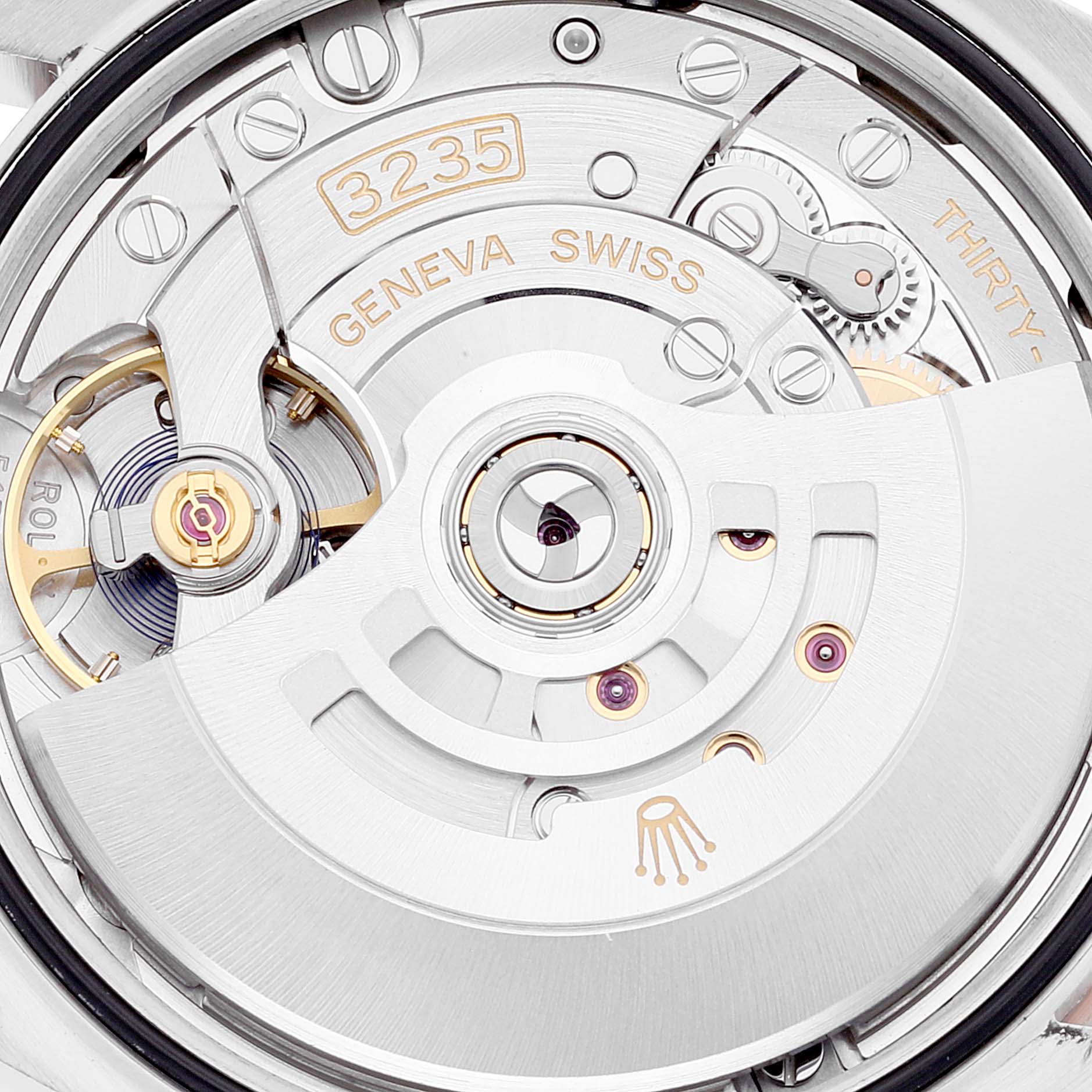 This image shows a close-up of the movement and internal mechanism of a Rolex Datejust 126231 Men's Steel and Gold (two tone) White Dial 126231 Men's Steel and Gold (two tone) White Dial watch.