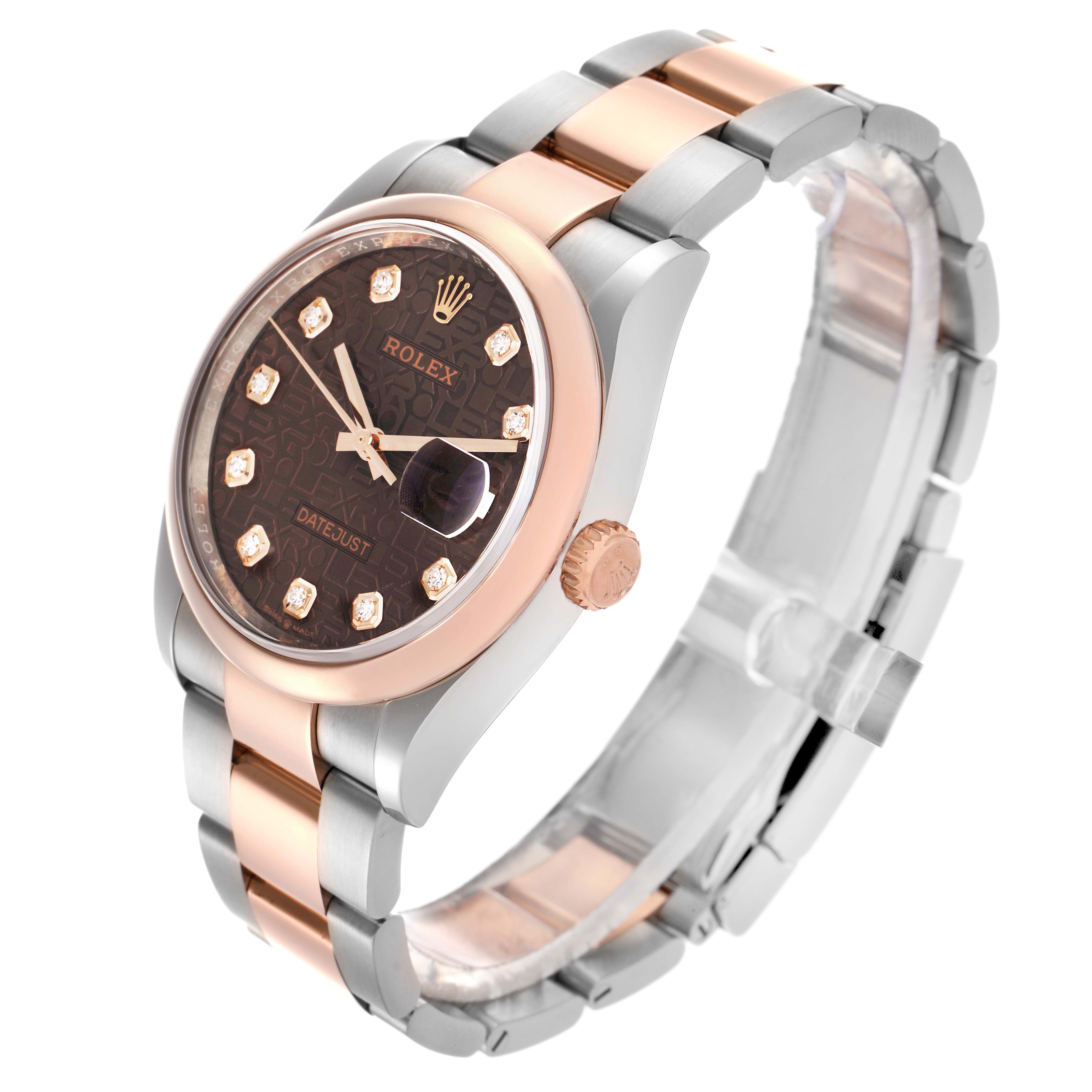 The Rolex Datejust 126201G Men's Steel and Gold (two tone) Brown Dial 126201G Men's Steel and Gold (two tone) Brown Dial watch is shown at a three-quarter angle, displaying the face, bezel, crown, and bracelet.