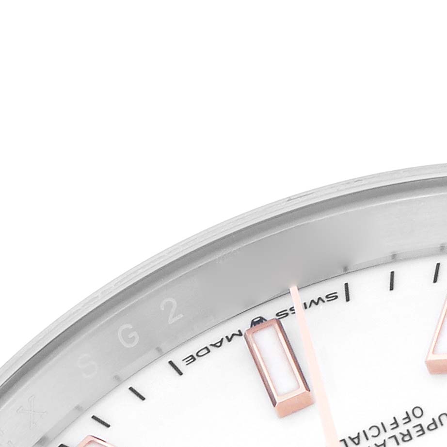 The image shows a close-up of the dial edge and markers of a Rolex Datejust 126201 Men's Steel and Gold (two tone) White Dial 126201 Men's Steel and Gold (two tone) White Dial watch.