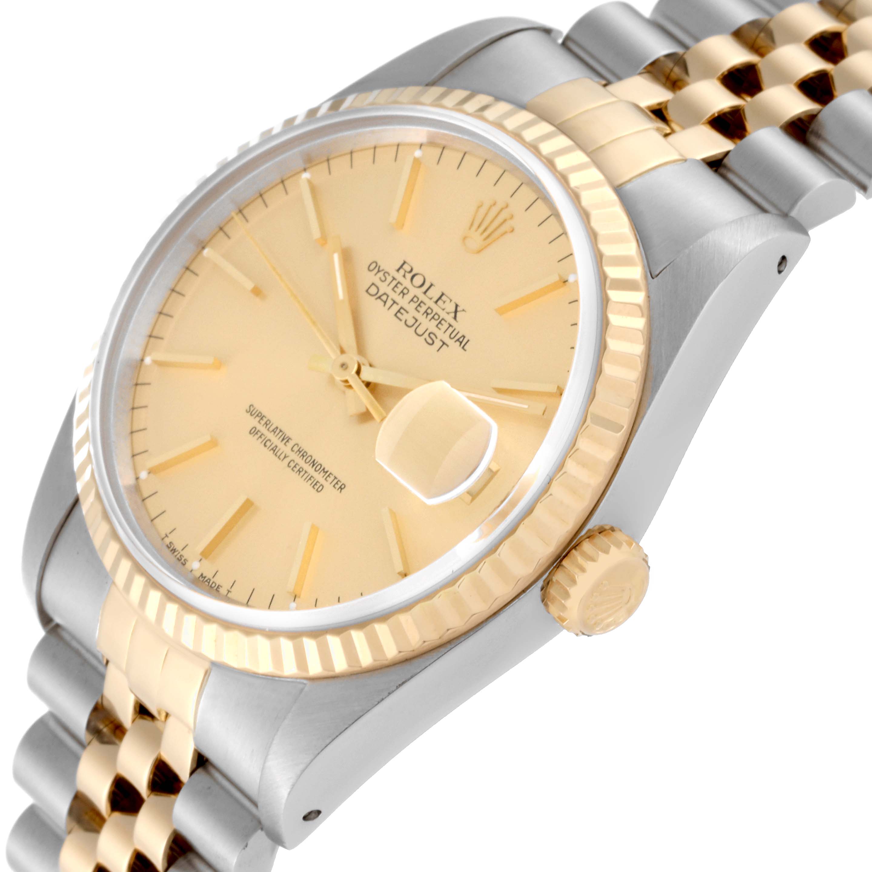 The image shows a Rolex Datejust 16233 Men's Steel and Gold (two tone) Champagne Dial 16233 Men's Steel and Gold (two tone) Champagne Dial watch at an oblique angle, including the dial, fluted bezel, crown, and part of the bracelet.