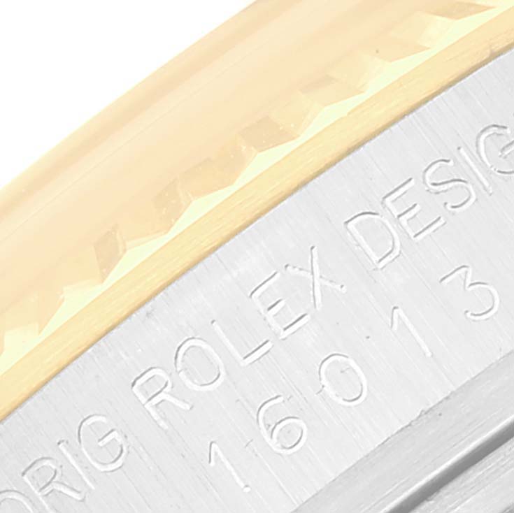 The image shows a close-up of the bezel and case edge of the Rolex Vintage Collection 16013 Men's Steel and Gold (two tone) Champagne Dial 16013 Men's Steel and Gold (two tone) Champagne Dial model.