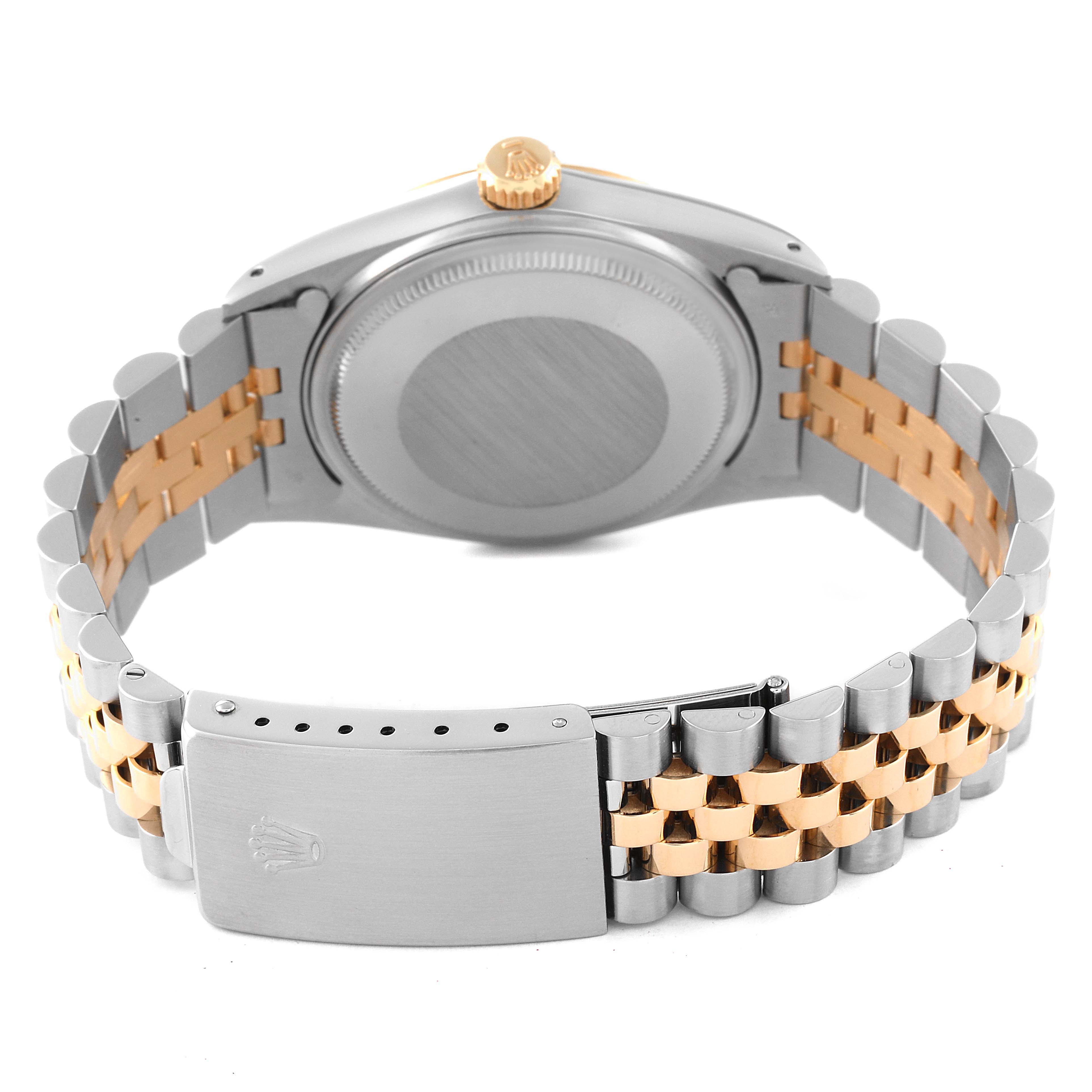 The image shows the back and clasp of a Rolex Vintage Collection 16013 Men's Steel and Gold (two tone) Champagne Dial 16013 Men's Steel and Gold (two tone) Champagne Dial watch, with its two-tone metal bracelet.