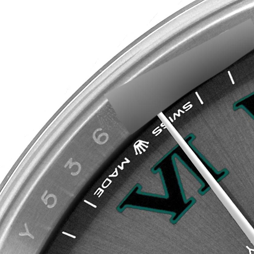 The image shows a close-up of the Rolex Datejust 41 126334 Men
s Stainless Steel Grey Dial 126334 Men
s Stainless Steel Grey Dial watch, focusing on the edge of the dial and part of the bezel.