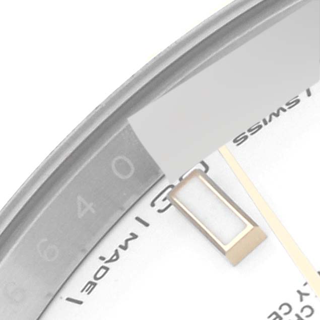 The image shows a close-up angle of the Rolex Datejust 41 126333 Men's Steel and Gold (two tone) White Dial 126333 Men's Steel and Gold (two tone) White Dial model, highlighting the bezel, dial edge, and a portion of the hour marker.