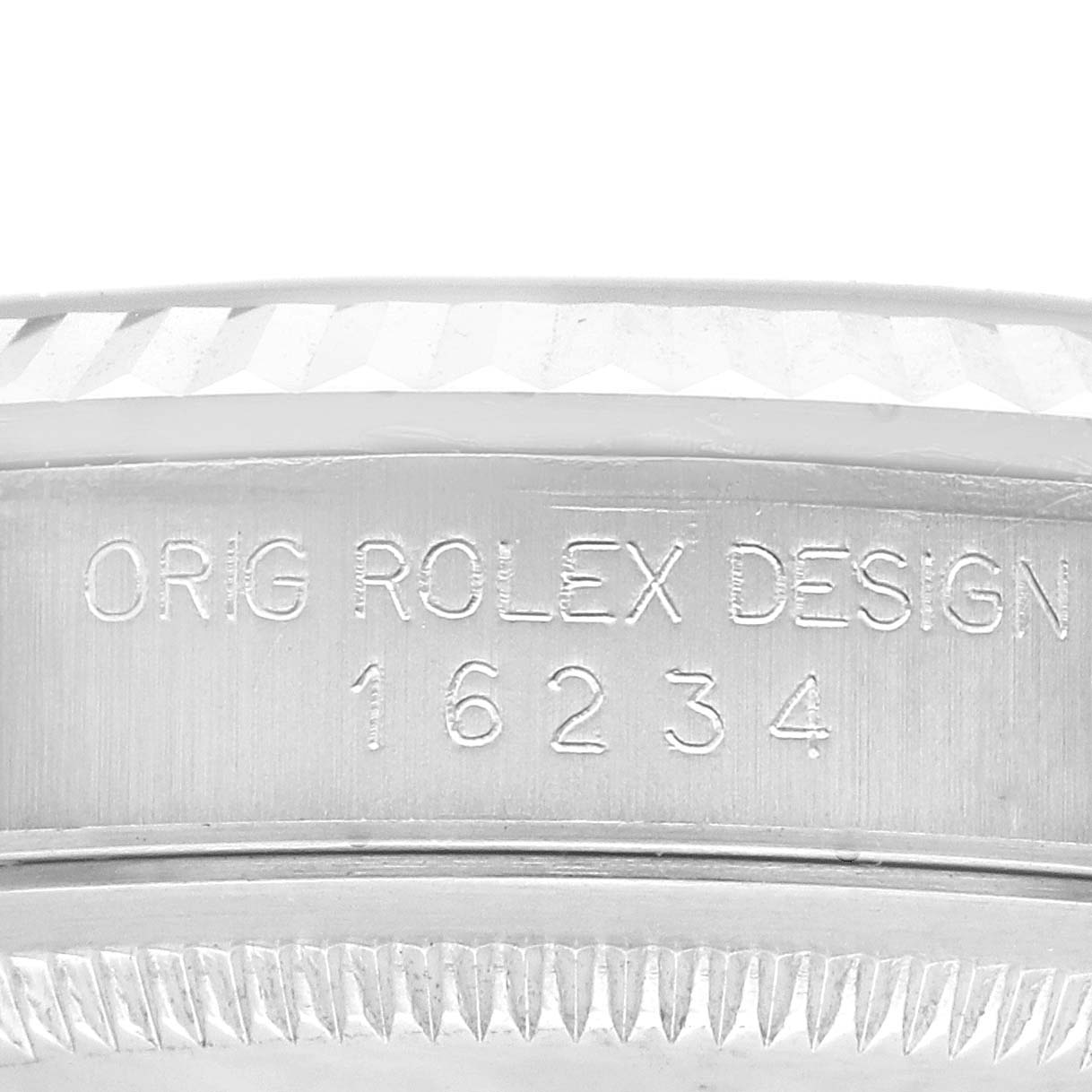 The image shows the reference number and part of the bezel of a Rolex Datejust 16234 Men's Stainless Steel Black Dial 16234 Men's Stainless Steel Black Dial watch.