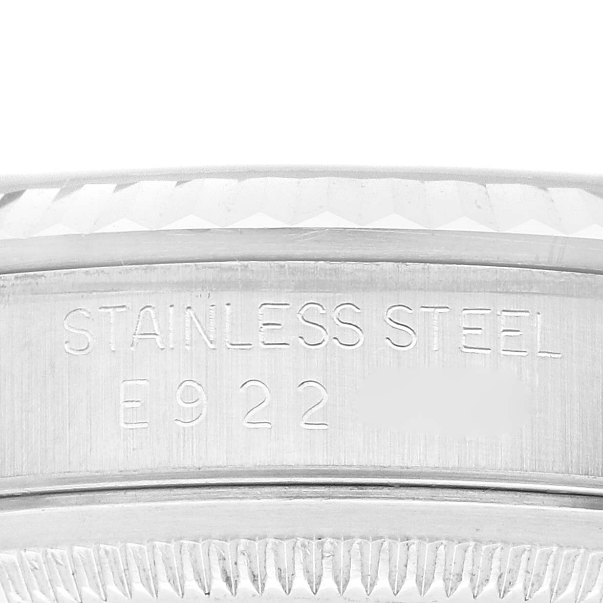 This close-up shows the engraved stainless steel part of the Rolex Datejust 16234 Men's Stainless Steel Black Dial 16234 Men's Stainless Steel Black Dial watch.
