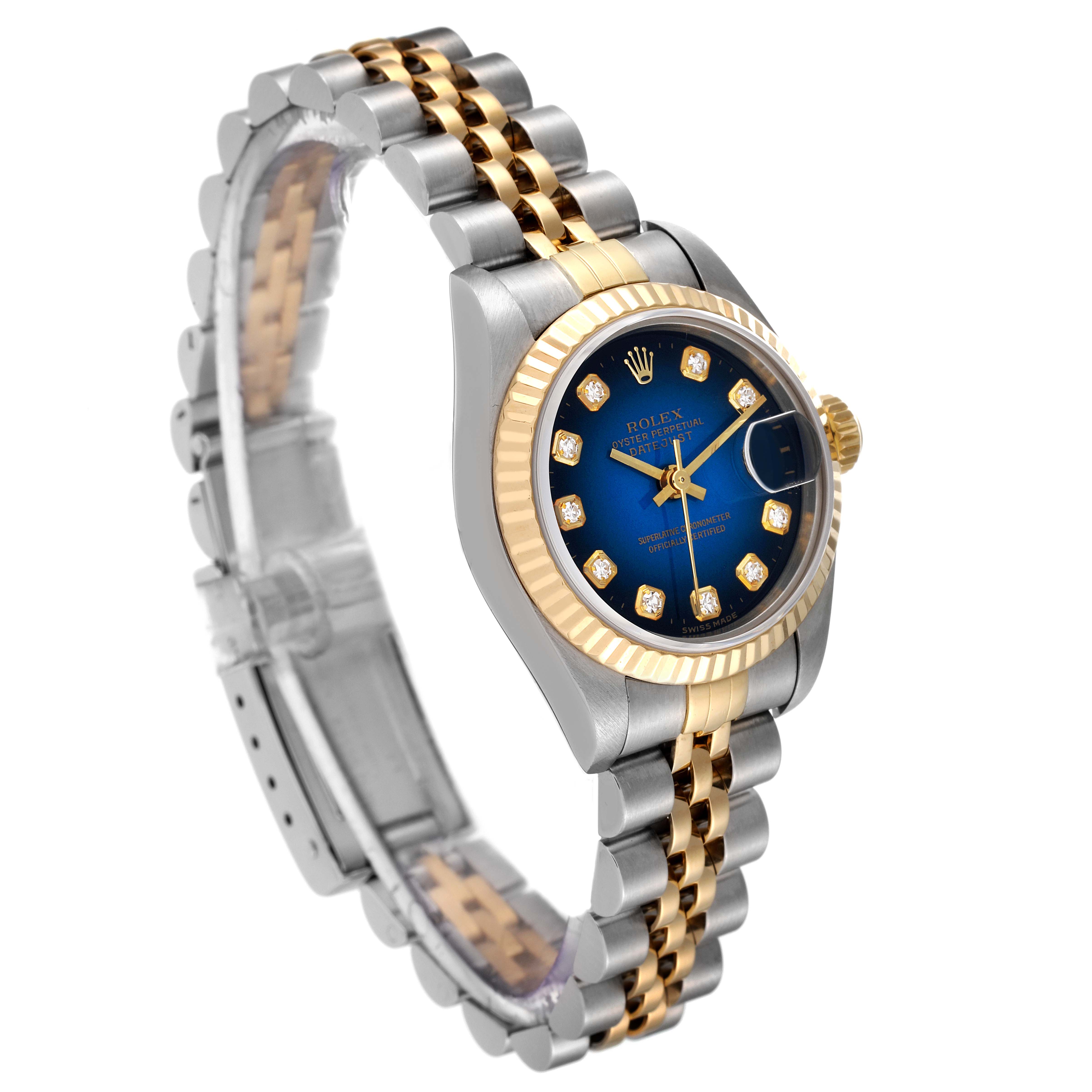 This Rolex Datejust 69173 Women's Steel and Gold (two tone) Blue Dial 69173 Women's Steel and Gold (two tone) Blue Dial watch is shown at an angled view, revealing its blue dial, diamond hour markers, fluted bezel, and two-tone bracelet.