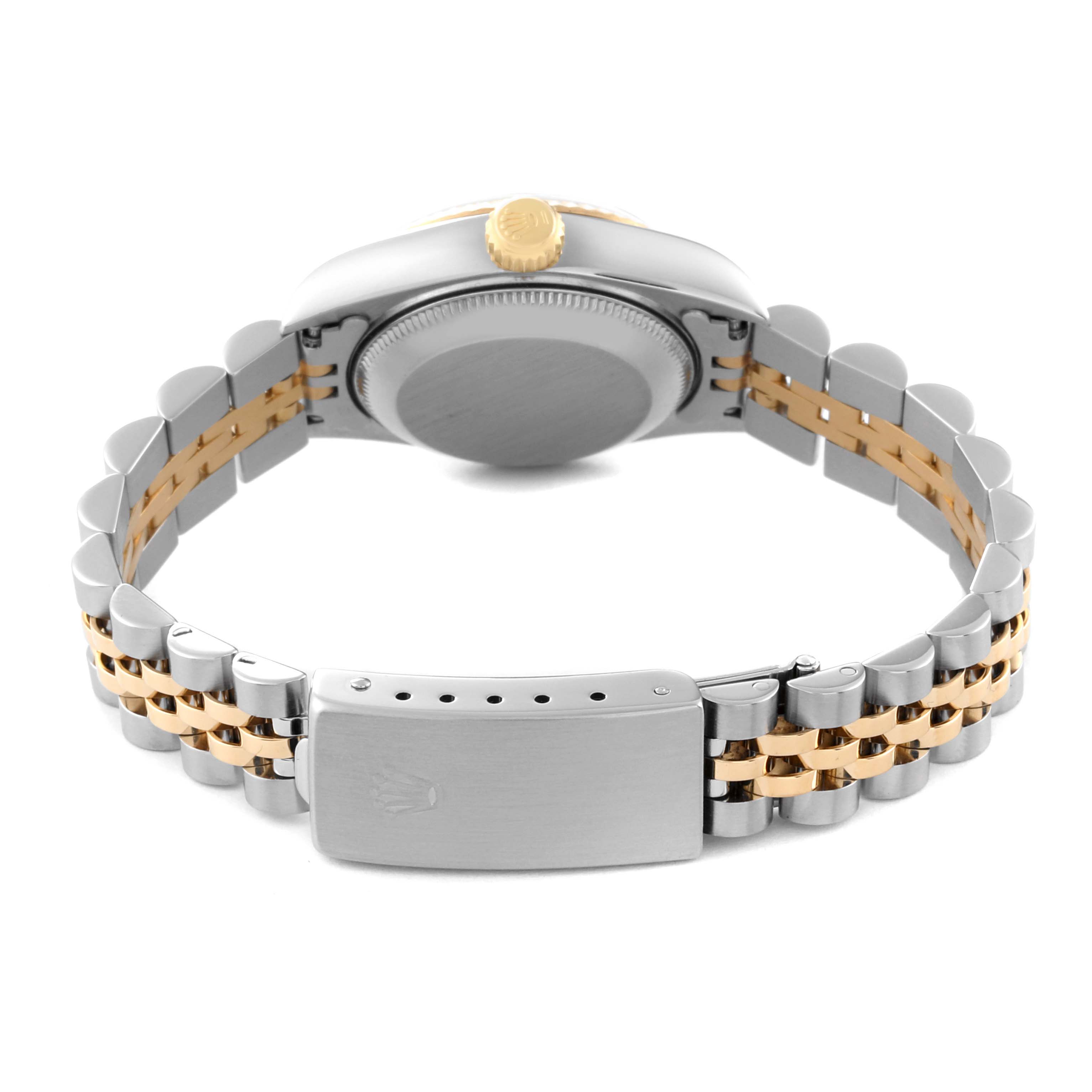 The image shows the back of the Rolex Datejust 69173 Women's Steel and Gold (two tone) Silver Dial 69173 Women's Steel and Gold (two tone) Silver Dial watch and its two-tone bracelet, focusing on the clasp and case back.