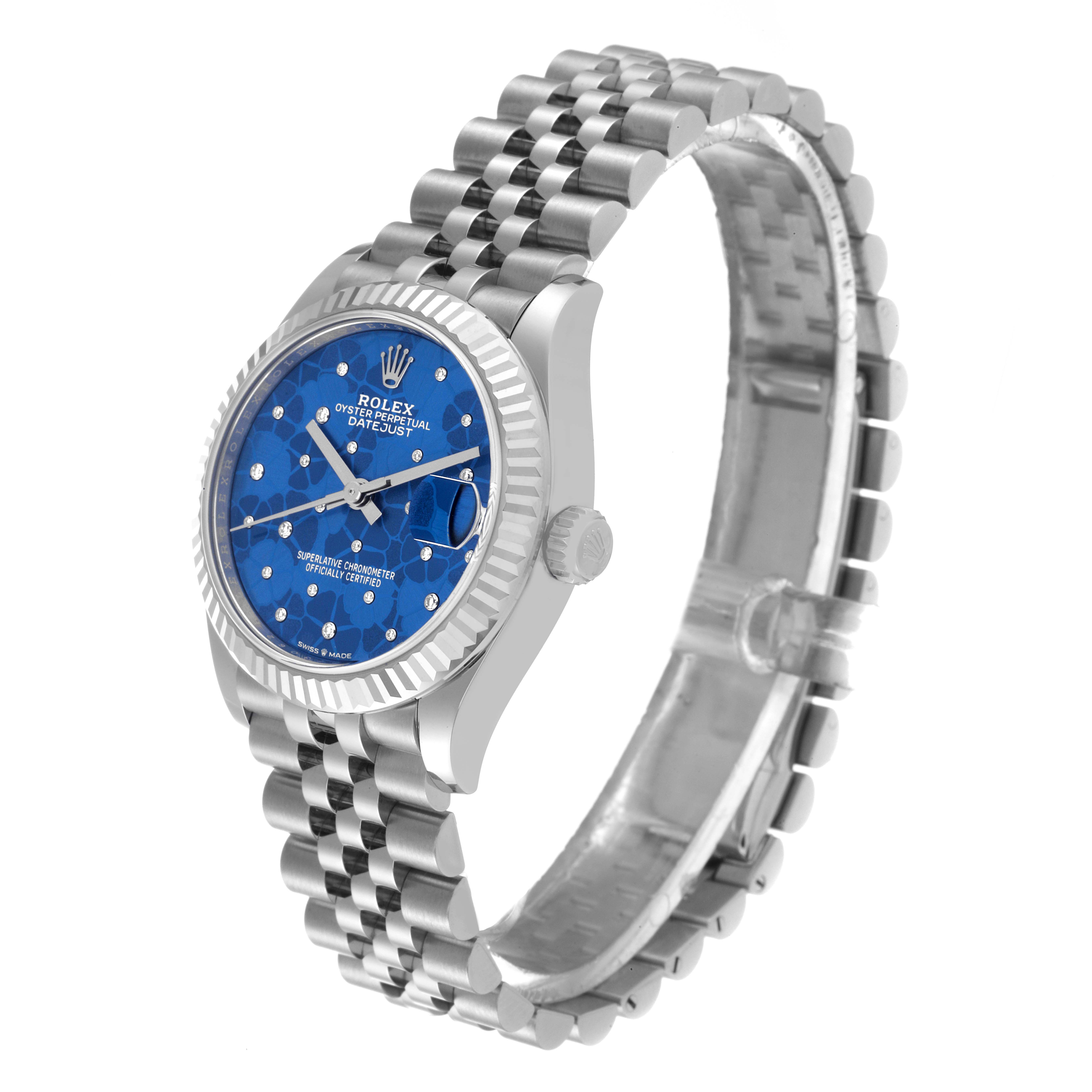 The Rolex Mid-Size 278274 Women's Stainless Steel Blue Dial 278274 Women's Stainless Steel Blue Dial watch is shown from a side angle, displaying the blue dial, bezel, crown, and metallic bracelet.
