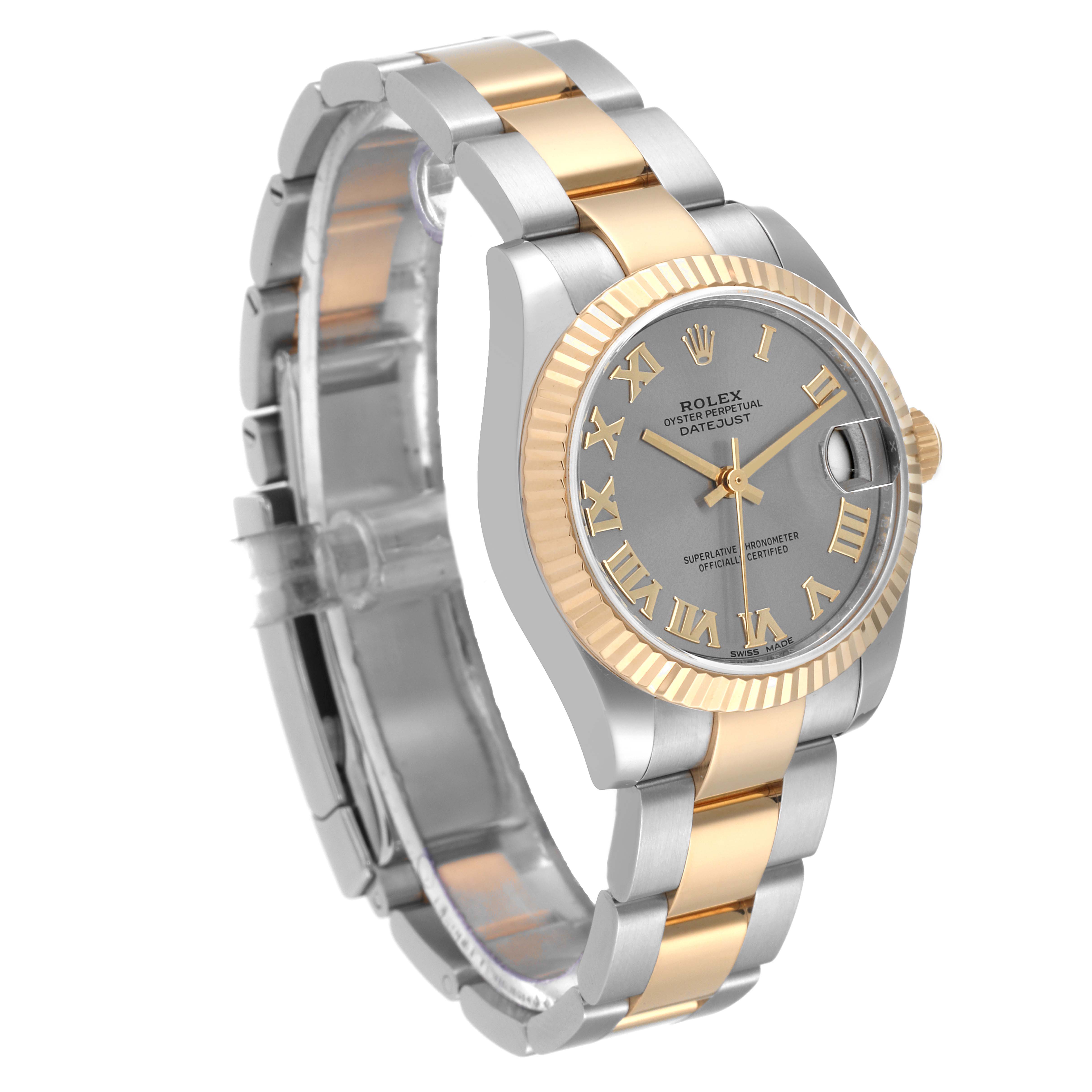 The image shows a side and front angle of a Rolex Mid-Size 178273 Women
s Steel and Gold (two tone) Grey Dial 178273 Women
s Steel and Gold (two tone) Grey Dial Oyster Perpetual Datejust watch with a two-tone band and fluted bezel.