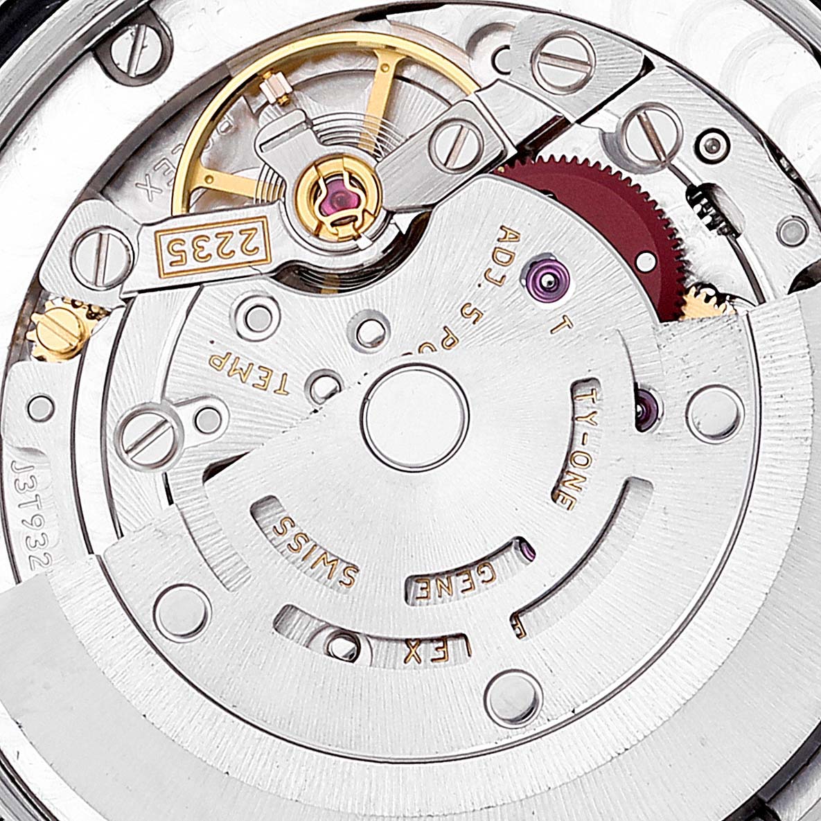 This image shows an up-close view of the movement mechanism of a Mid-Size Rolex watch.