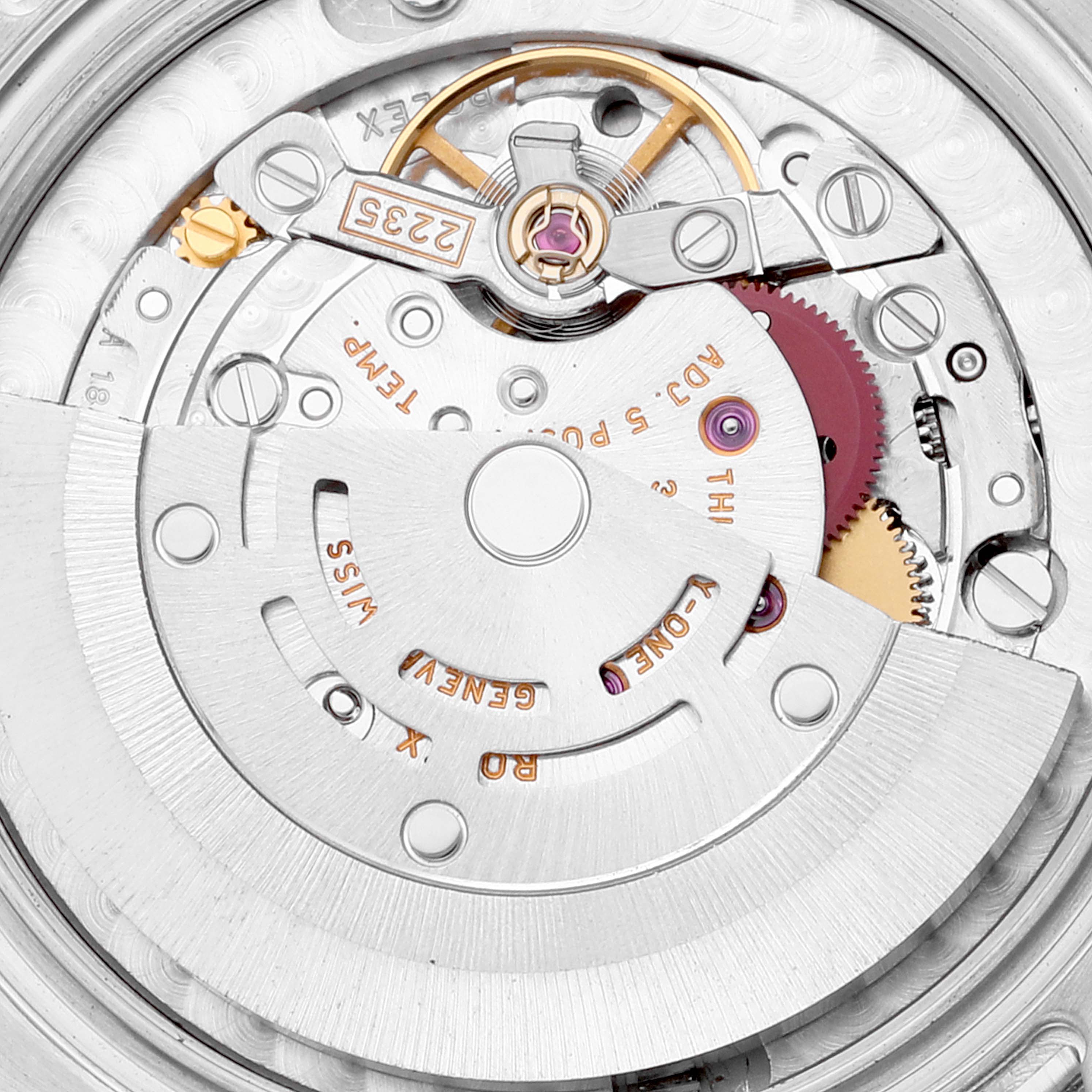 This close-up image shows the intricate automatic movement mechanism inside a Rolex Mid-Size 178274 Women
s Stainless Steel Blue Dial 178274 Women
s Stainless Steel Blue Dial watch.