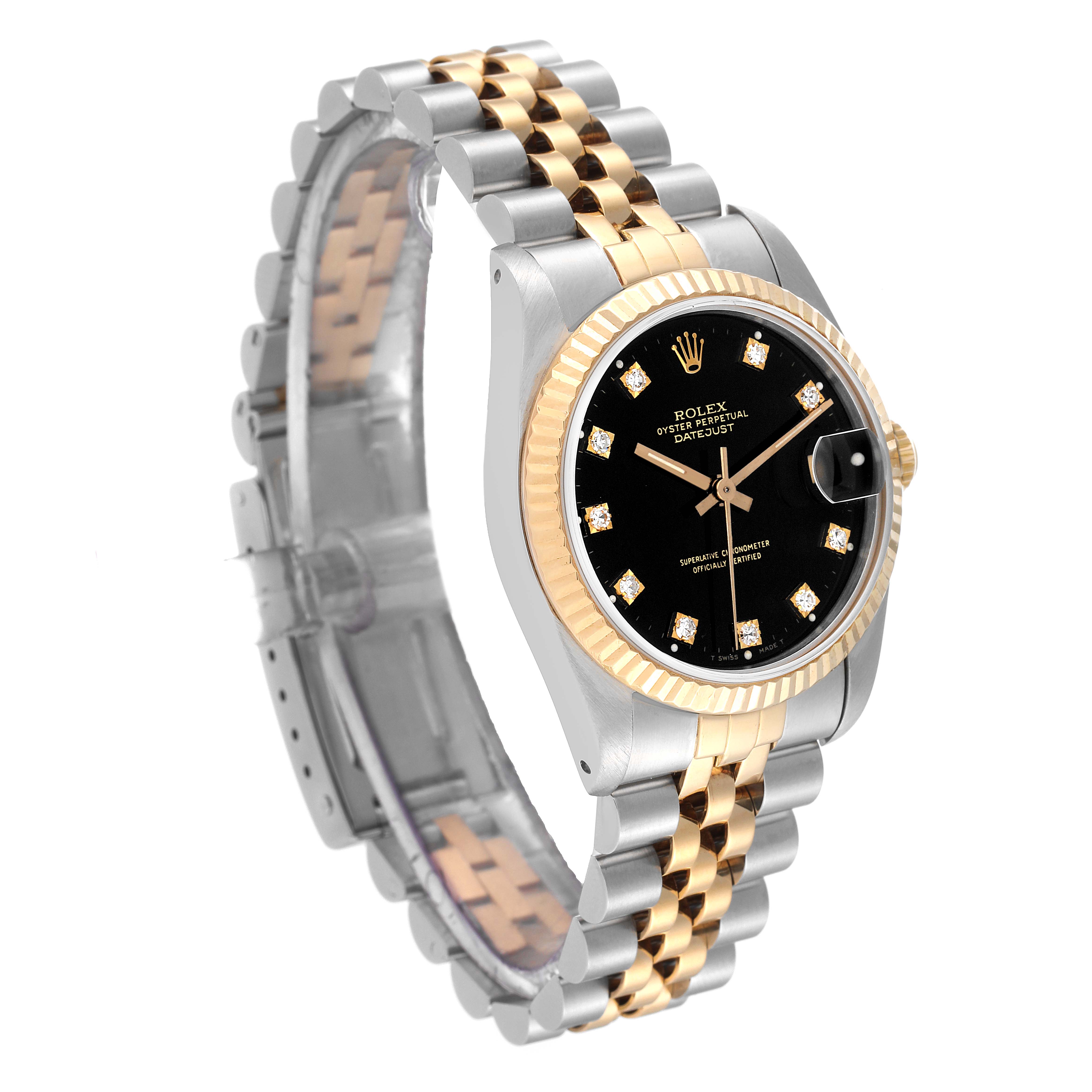 The image shows a Mid-Size Rolex Datejust watch at an oblique angle, highlighting its black dial, gold bezel, and two-tone bracelet.