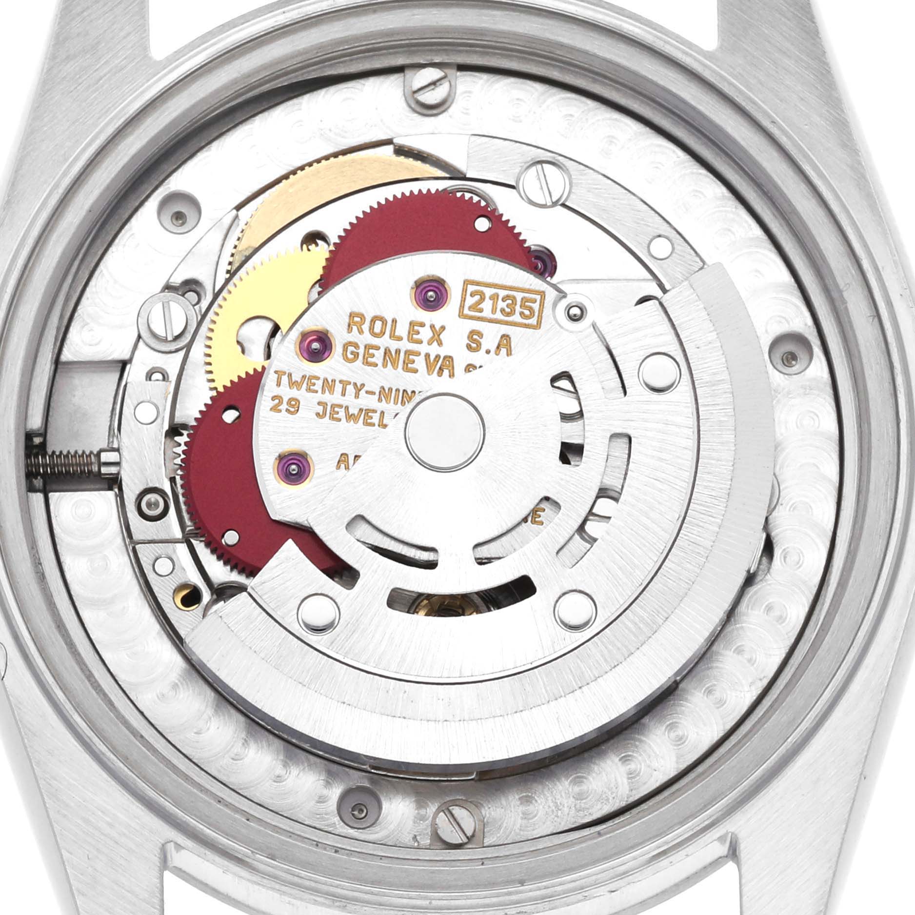The image shows the movement and inner mechanics of a Mid-Size Rolex model, viewed from the back.