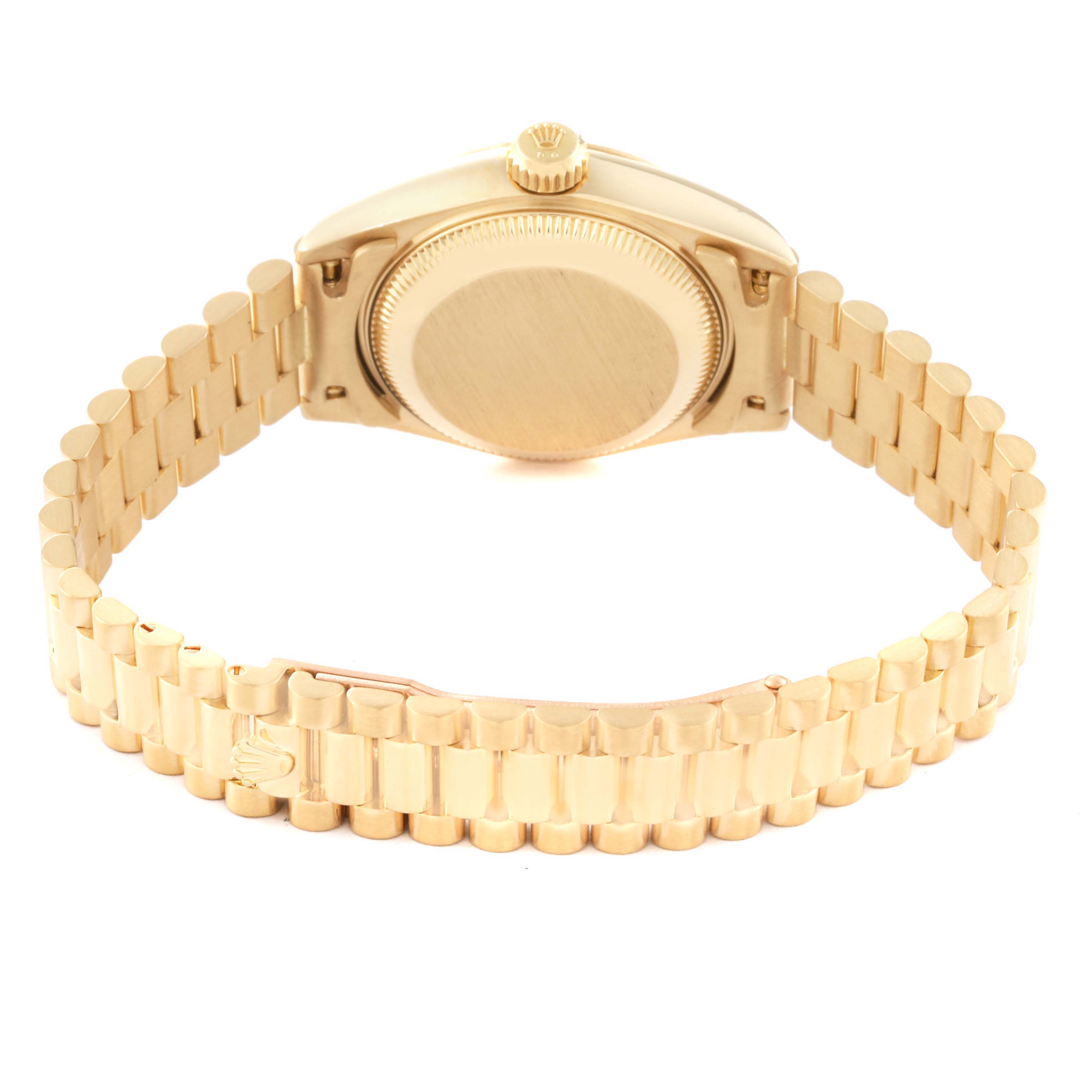 The image shows the backside and bracelet of the Rolex President 69178 Women
s Yellow Gold Champagne Dial 69178 Women
s Yellow Gold Champagne Dial model, highlighting the case back and gold links.