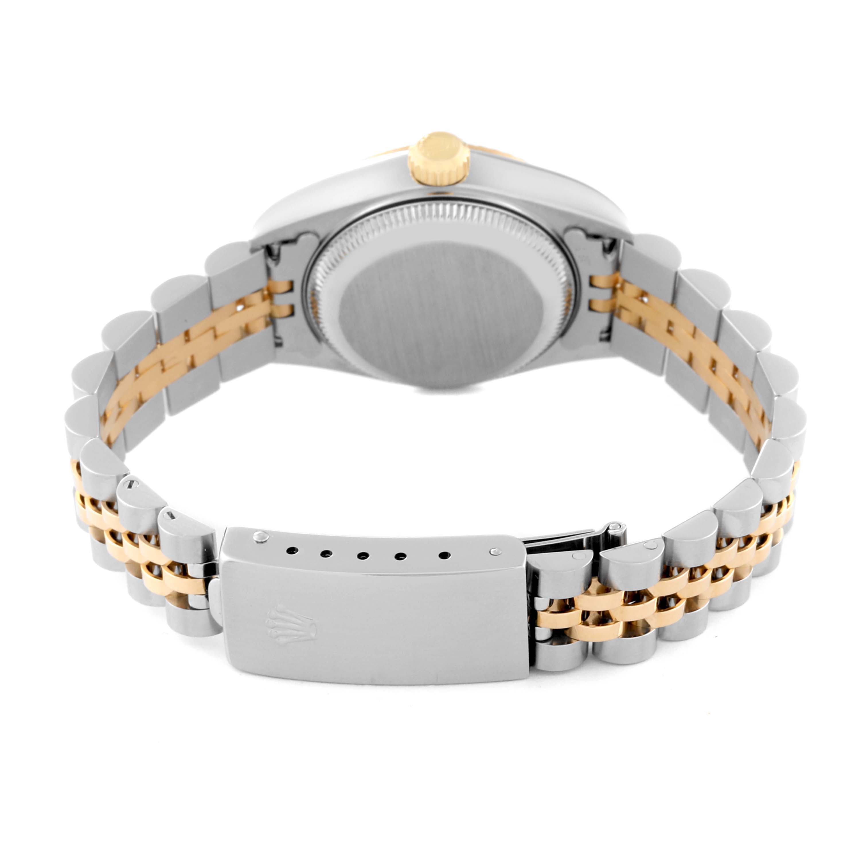 The image shows the back view of a Rolex Datejust 79173 Women's Steel and Gold (two tone) Black Dial 79173 Women's Steel and Gold (two tone) Black Dial watch, focusing on the case back and the two-tone metal bracelet with the clasp.