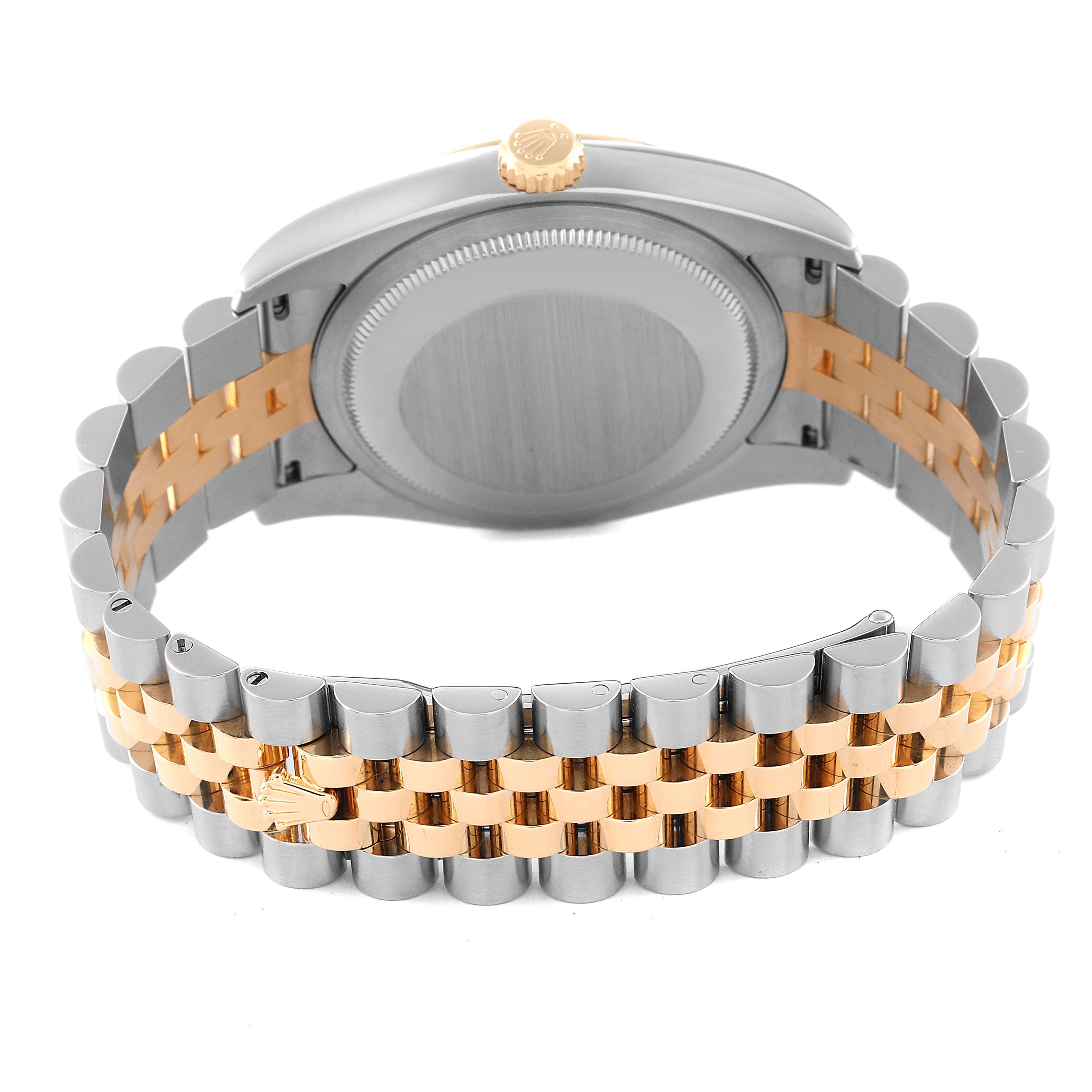 The image shows the back view of a Rolex Datejust 116233 Men's Steel and Gold (two tone) Black Dial 116233 Men's Steel and Gold (two tone) Black Dial watch, highlighting the case back and the two-tone Jubilee bracelet.