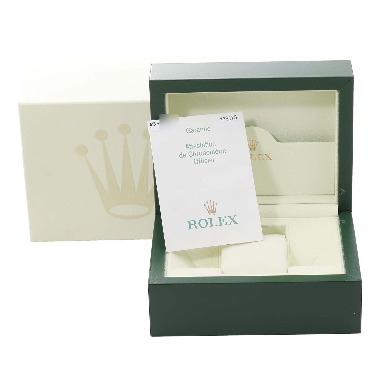 The image shows a Rolex Datejust 179173 Women's Steel and Gold (two tone) Blue Dial 179173 Women's Steel and Gold (two tone) Blue Dial watch box, with an official warranty certificate placed inside the open box.