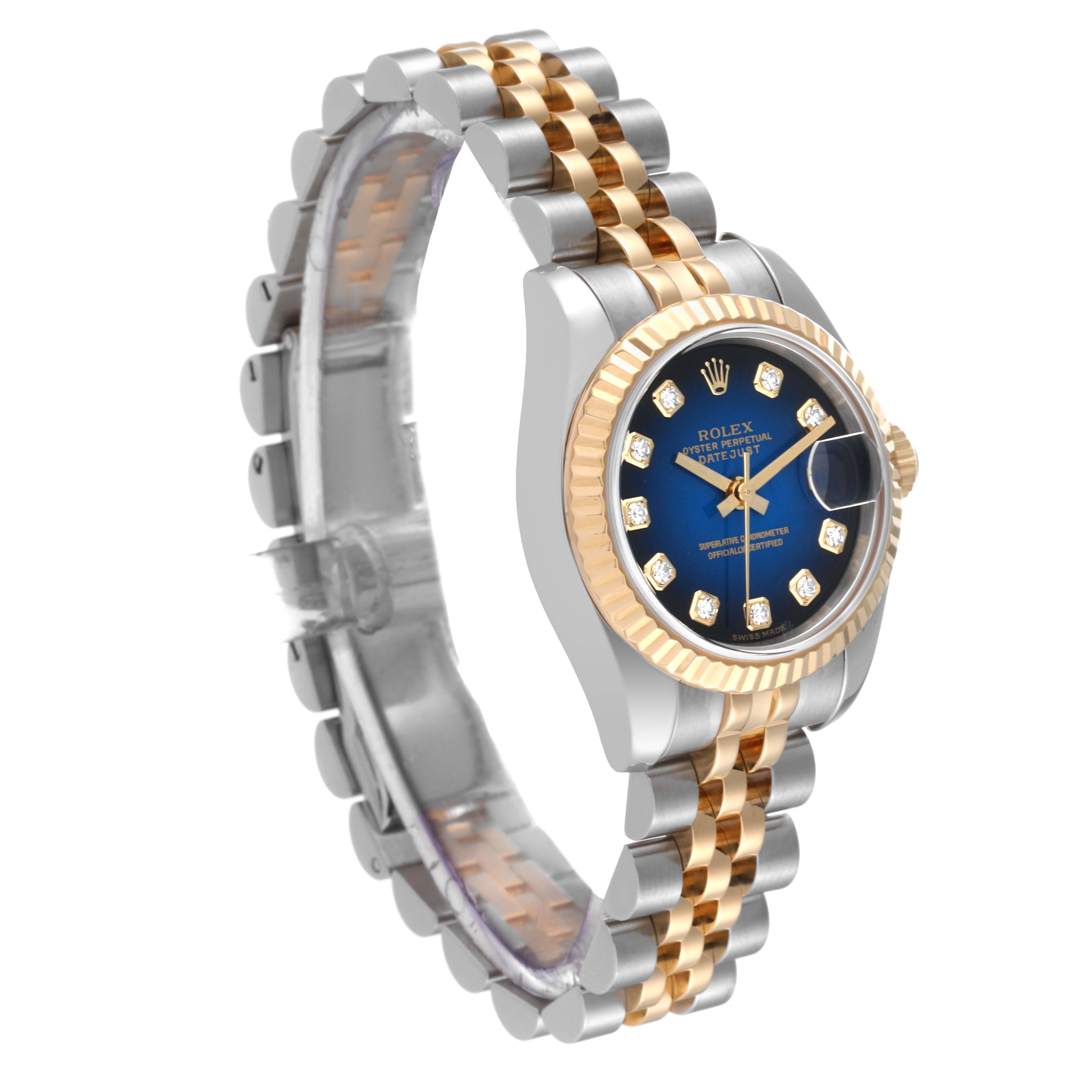 The Rolex Datejust 179173 Women's Steel and Gold (two tone) Blue Dial 179173 Women's Steel and Gold (two tone) Blue Dial watch is shown at a three-quarter angle, displaying the dial, bezel, and bracelet.
