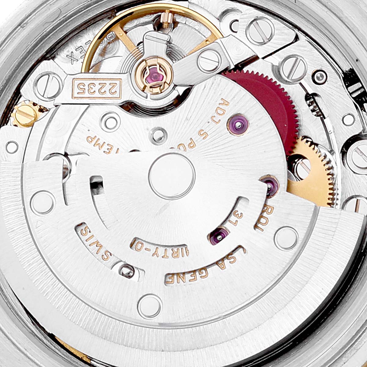 This image shows a close-up of the Rolex Datejust 179173 Women's Steel and Gold (two tone) Blue Dial 179173 Women's Steel and Gold (two tone) Blue Dial watch movement, highlighting the rotor, gears, and various intricate components.