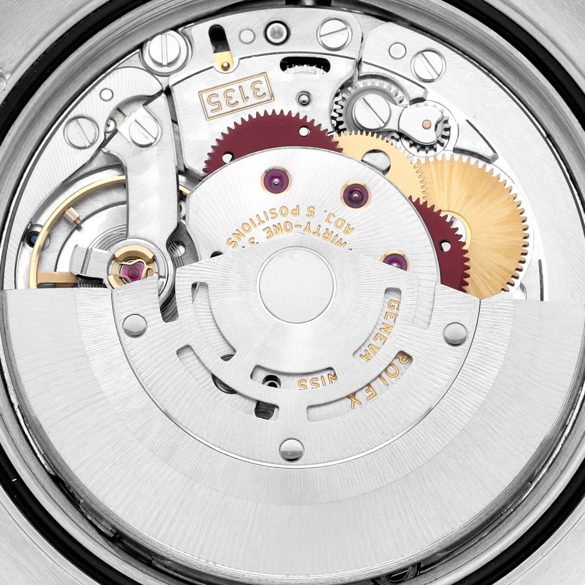 This image shows a close-up of the movement mechanism of a Rolex Datejust 116233 Men's Steel and Gold (two tone) Beige Dial 116233 Men's Steel and Gold (two tone) Beige Dial watch, highlighting gears and inscriptions.