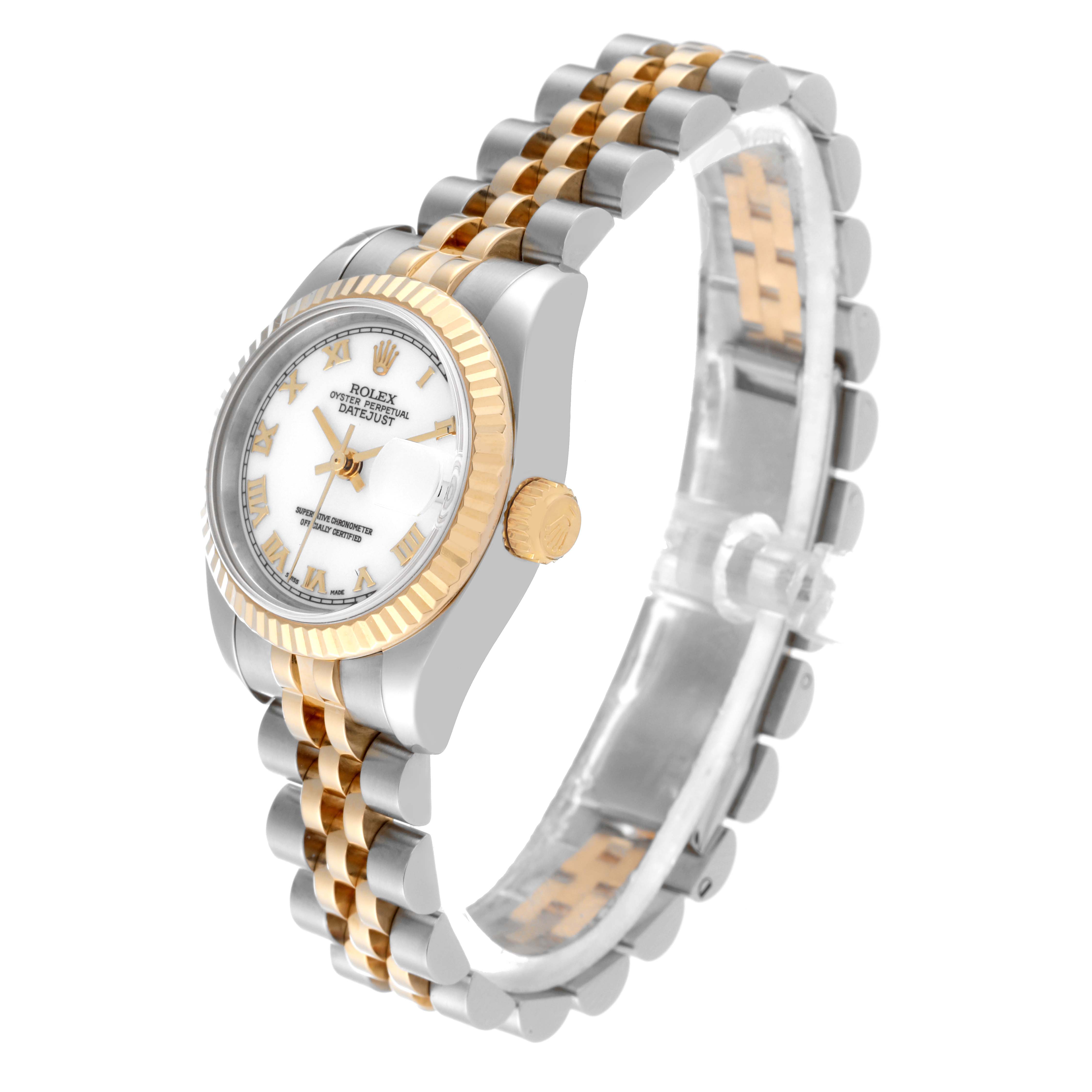 The image shows a Rolex Datejust 179173 Women's Steel and Gold (two tone) White Dial 179173 Women's Steel and Gold (two tone) White Dial watch at a three-quarter angle, highlighting the face, bezel, and two-tone bracelet.
