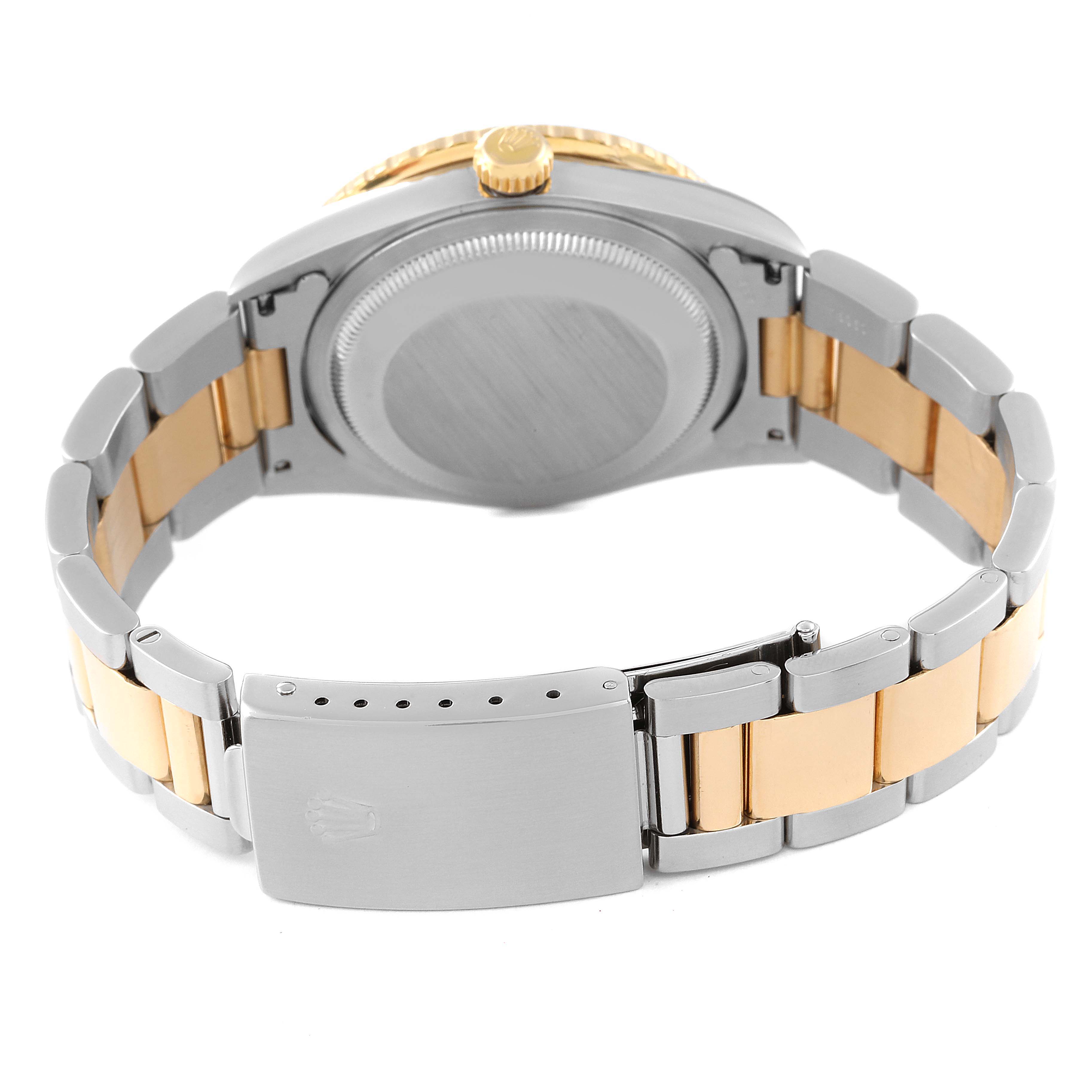 The image shows the back of a Rolex Turn-o-Graph 16263 Men
s Steel and Gold (two tone) White Dial 16263 Men
s Steel and Gold (two tone) White Dial watch, focusing on the clasp, bracelet, and case back.
