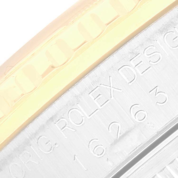 This close-up image shows the engraved bezel and case of a Rolex Turn-o-Graph 16263 Men
s Steel and Gold (two tone) White Dial 16263 Men
s Steel and Gold (two tone) White Dial watch.