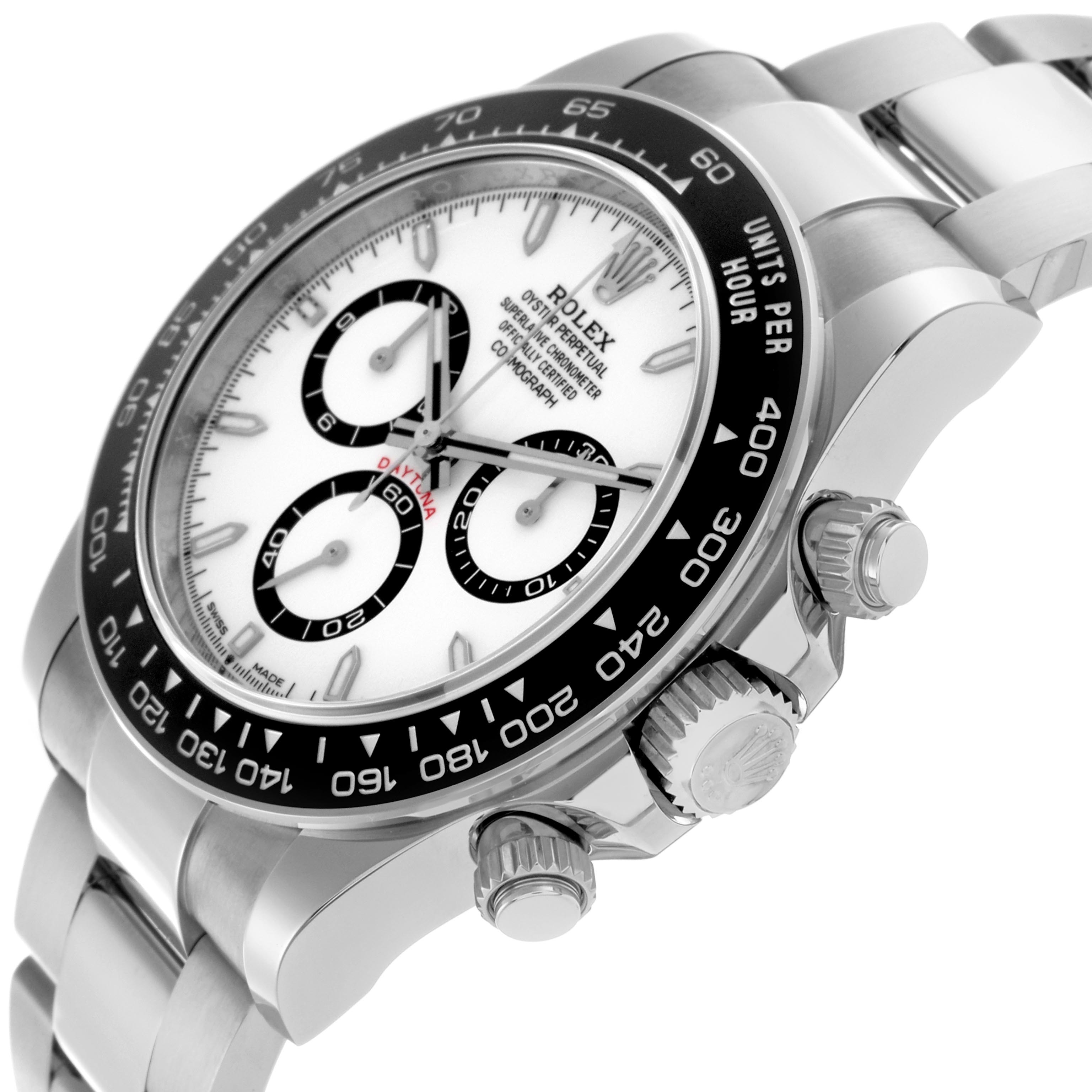 The Rolex Daytona 126500 Men's Stainless Steel White Dial 126500 Men's Stainless Steel White Dial watch is shown at an angled side view, displaying the dial, bezel, crown, and pushers.
