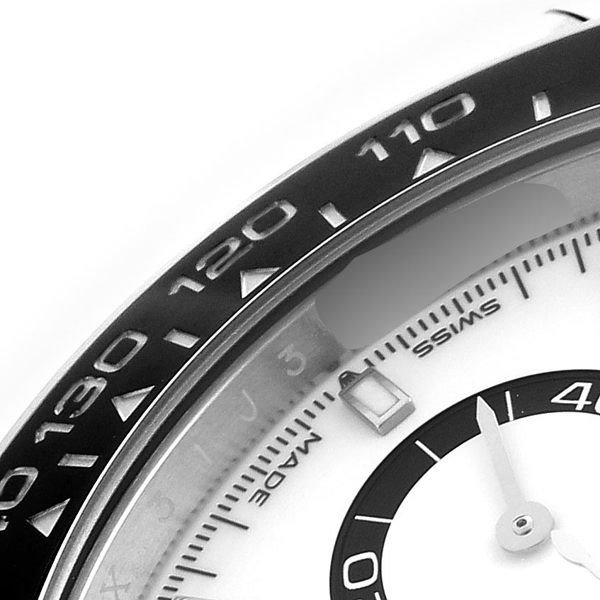 This image shows a close-up of the bezel and part of the dial on a Rolex Daytona 126500 Men's Stainless Steel White Dial 126500 Men's Stainless Steel White Dial watch, focused on the numeral markings.