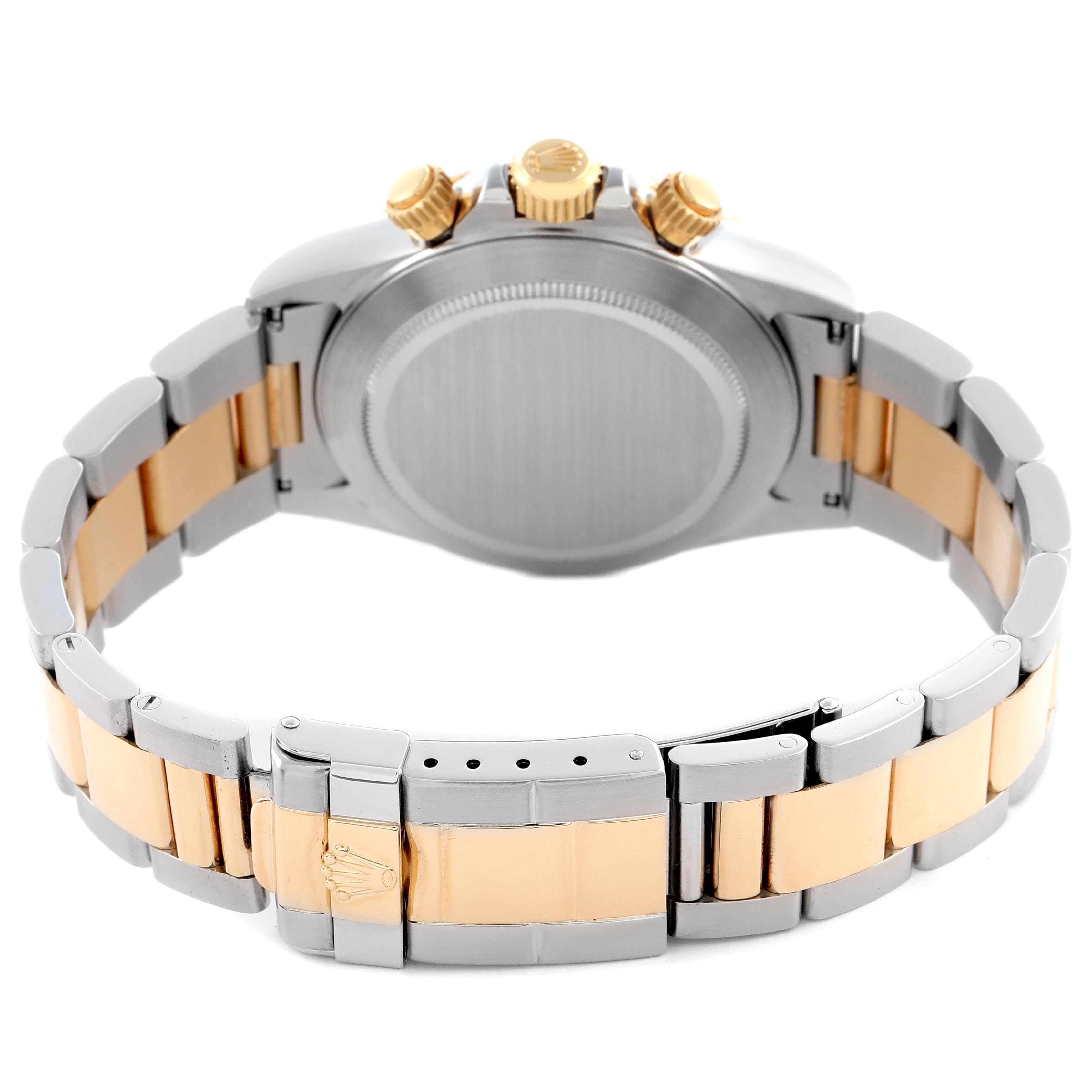 The image shows the back of a Rolex Daytona 16523 Men's Steel and Gold (two tone) Champagne Dial 16523 Men's Steel and Gold (two tone) Champagne Dial, displaying the bracelet, clasp, and case back at an angled view.