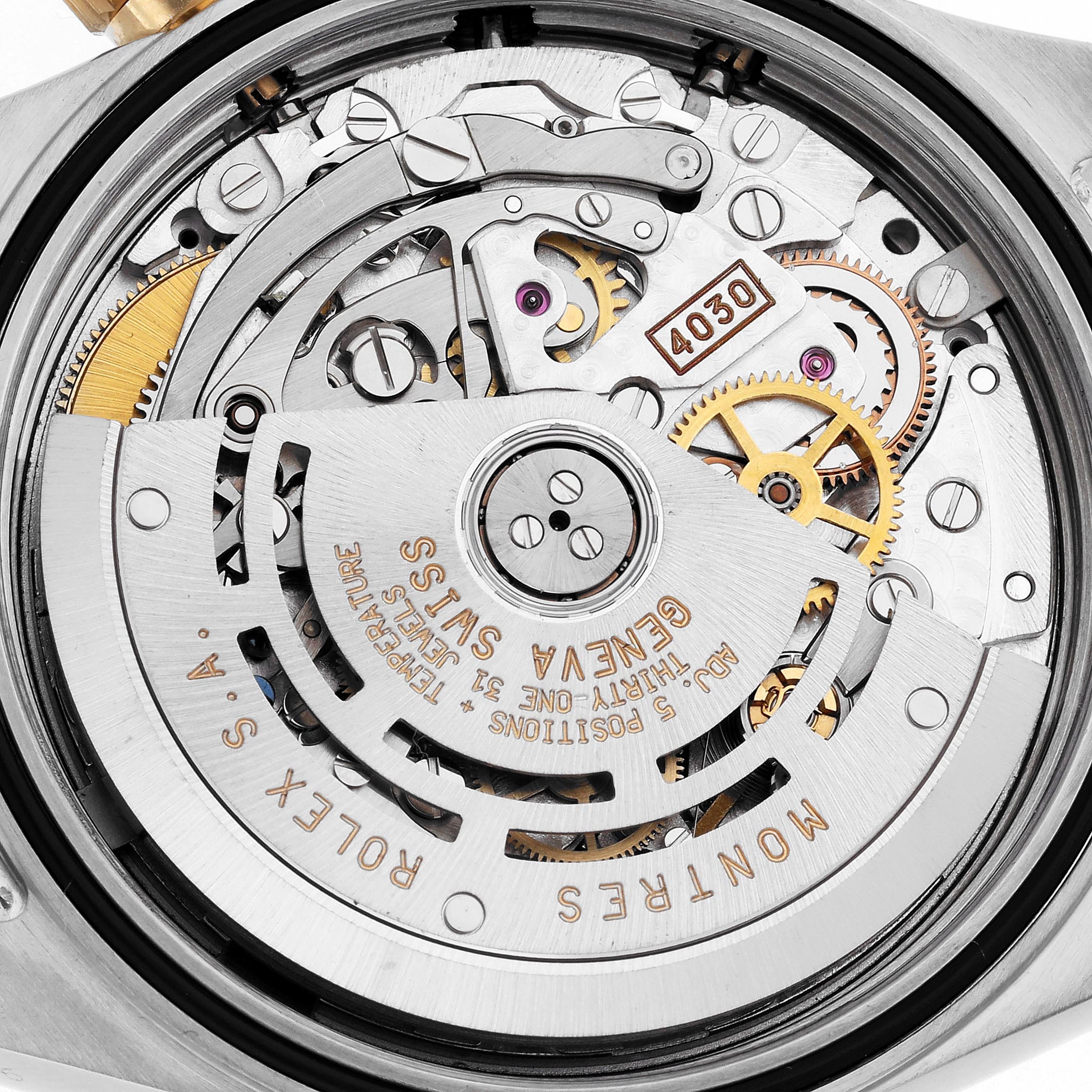 This image shows the movement and rotor of a Rolex Daytona 16523 Men's Steel and Gold (two tone) Black Dial 16523 Men's Steel and Gold (two tone) Black Dial watch from the back.