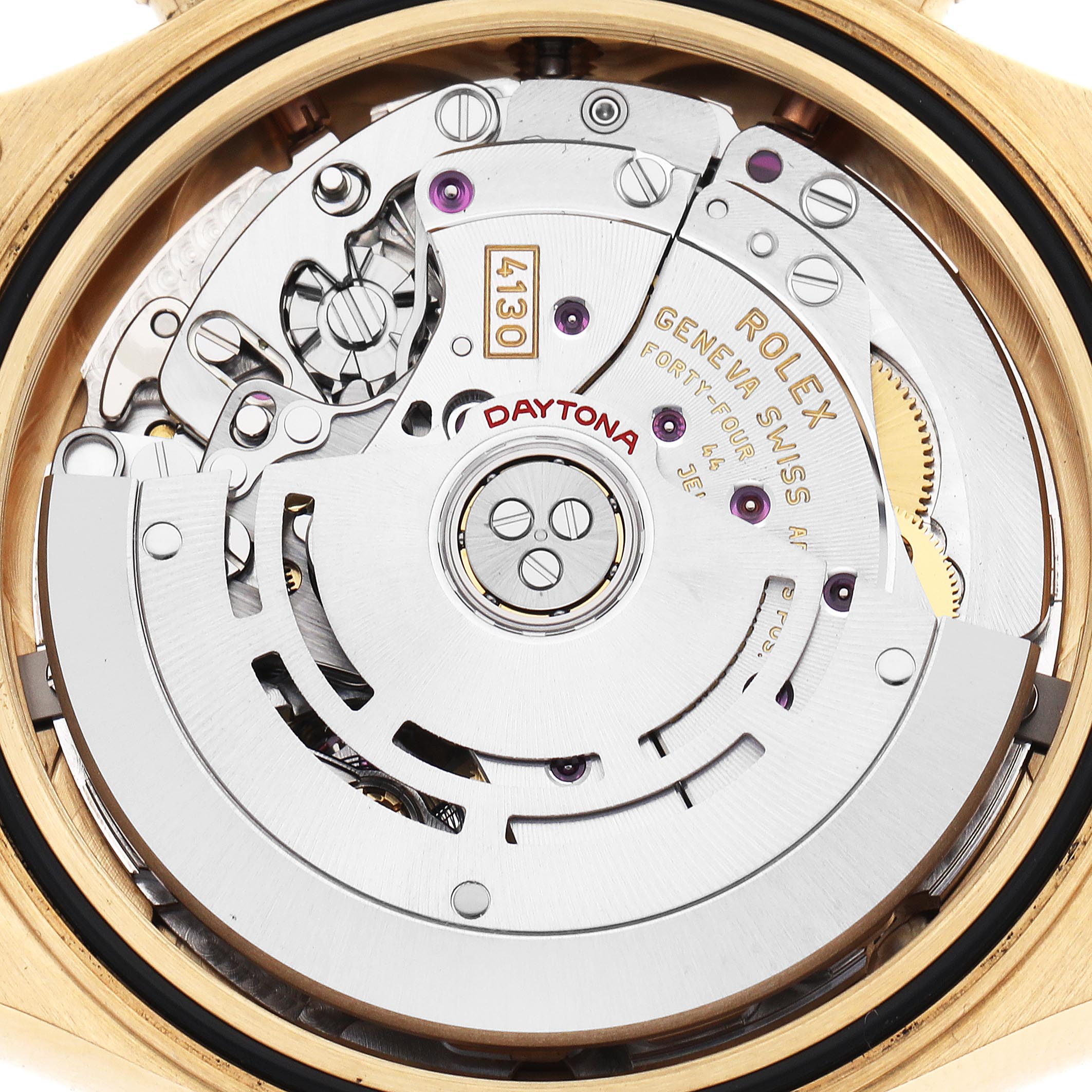 The image shows the movement of a Rolex Daytona 116518LN Men's Yellow Gold Mother of Pearl Dial 116518LN Men's Yellow Gold Mother of Pearl Dial watch, displaying intricate mechanical components from a rear angle.