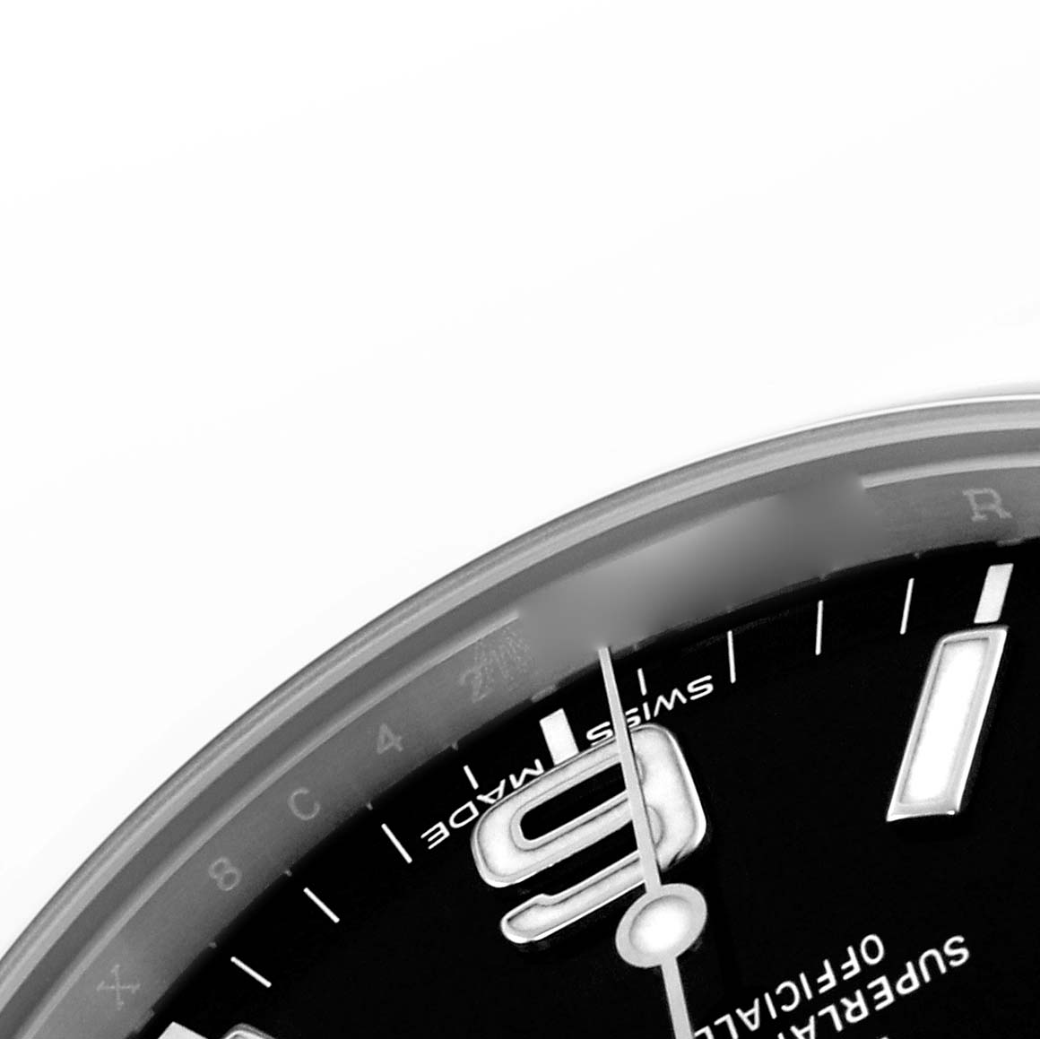 The image shows a close-up of the Rolex Explorer 214270 Men's Stainless Steel Black Dial 214270 Men's Stainless Steel Black Dial's dial, highlighting the numeral "9" and surrounding markers at an angled view.
