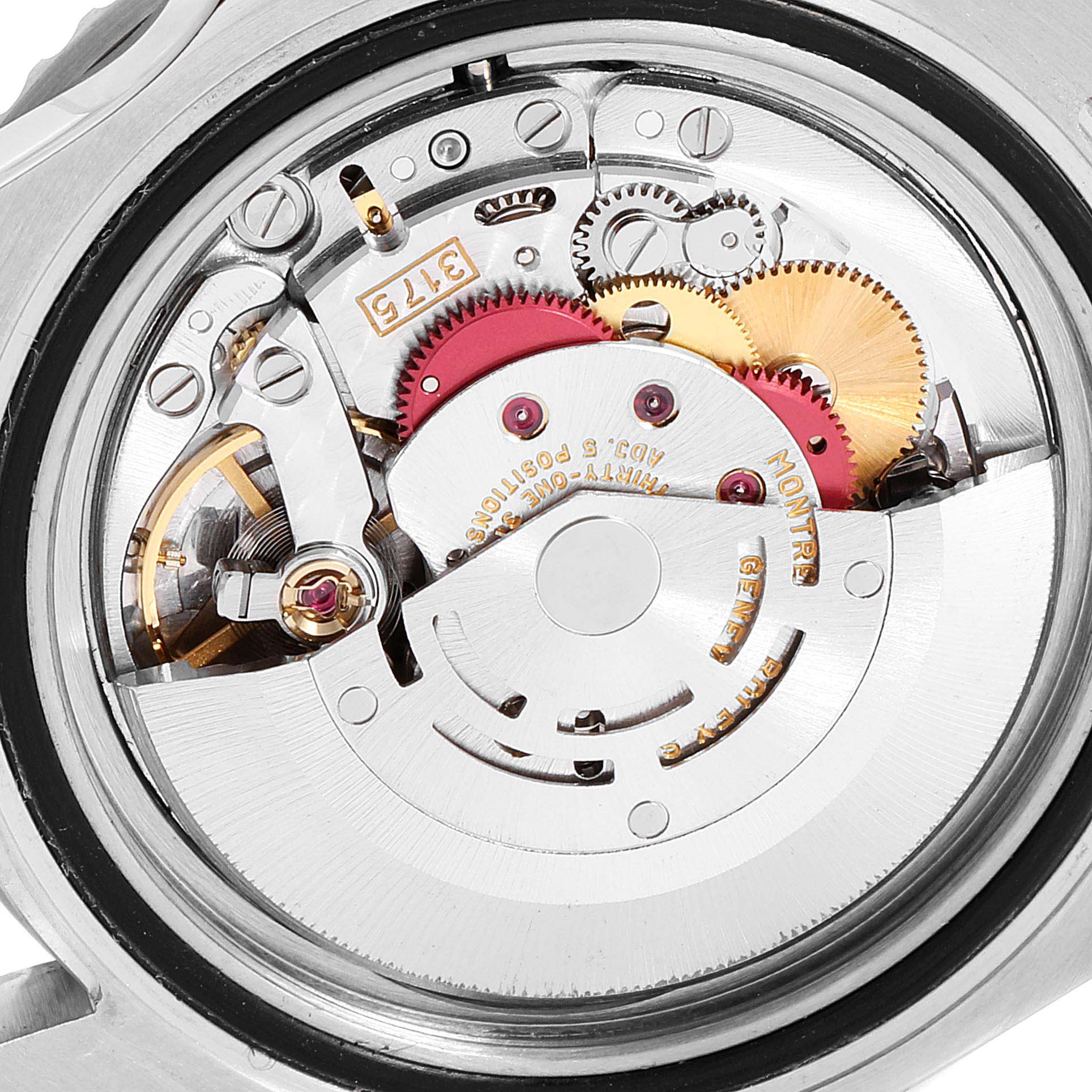 This image shows the intricate movement and internal mechanisms of the Rolex GMT-Master 16700 Men
s Stainless Steel Black Dial 16700 Men
s Stainless Steel Black Dial watch from a close-up, back angle.