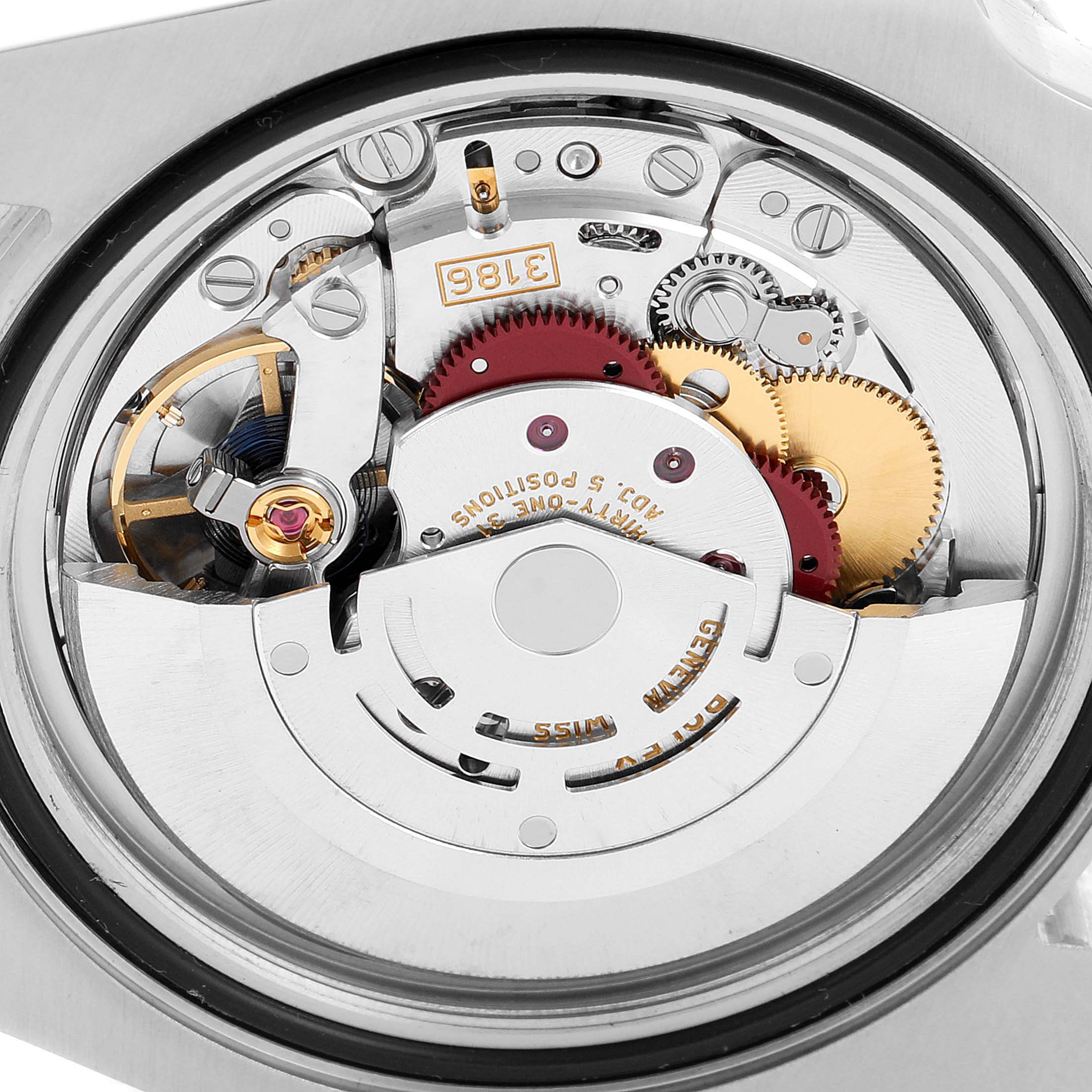 This image shows the movement and internal components of a Rolex GMT-Master 116710 BLNR Men
s Stainless Steel Black Dial 116710 BLNR Men
s Stainless Steel Black Dial watch from a rear view angle.