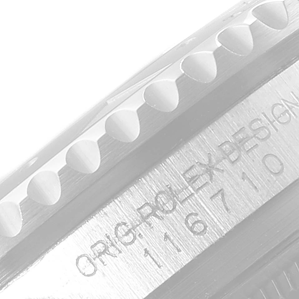 This close-up image shows the engraved case and bezel of the Rolex GMT-Master 116710 BLNR Men
s Stainless Steel Black Dial 116710 BLNR Men
s Stainless Steel Black Dial watch from a side angle.